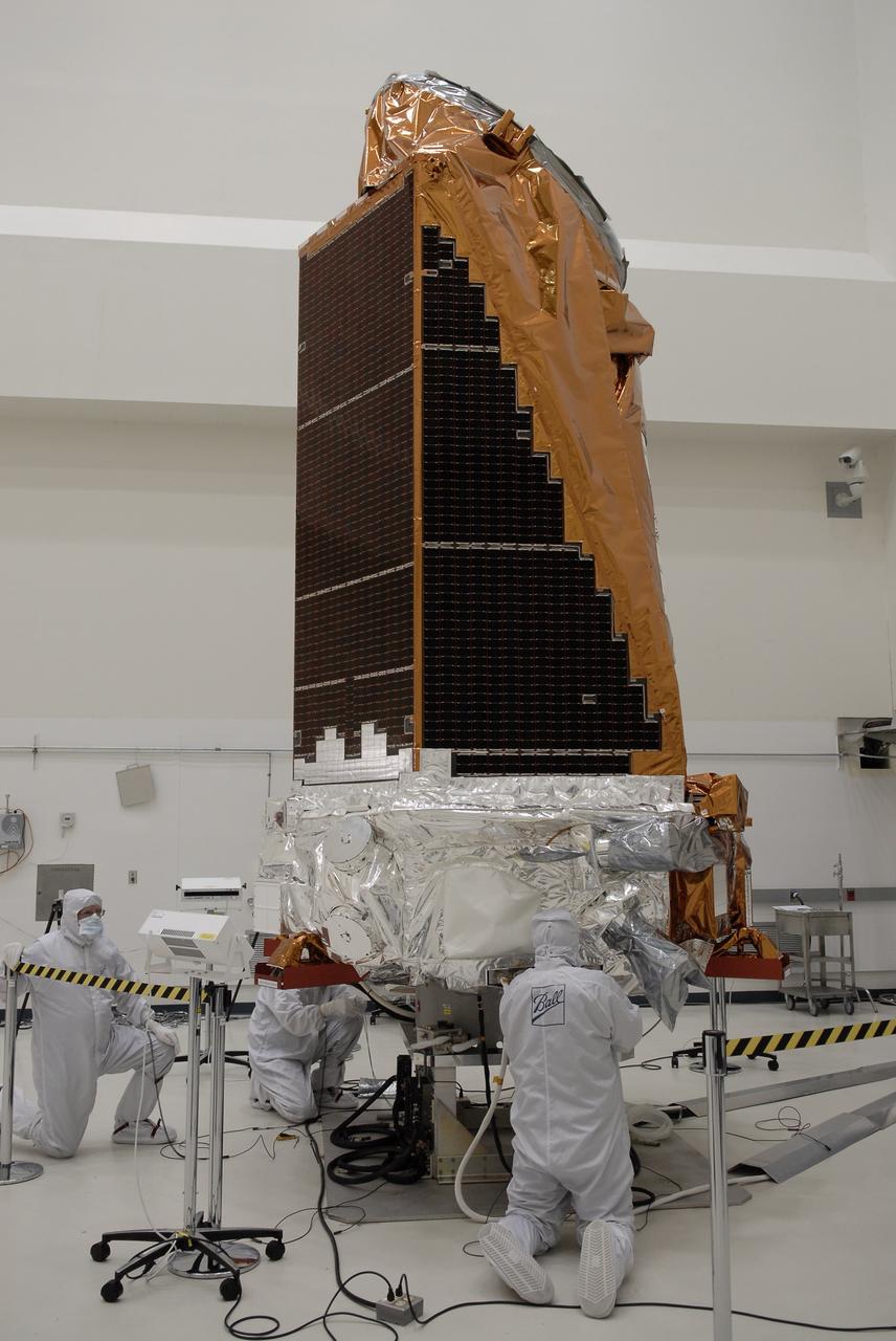 CAPE CANAVERAL, Fla. -- At the Astrotech payload processing facility in Titusville, Fla., NASA's Kepler spacecraft is unbagged. The spacecraft will undergo initial testing before launch. A NASA Discovery mission, Kepler is specifically designed to survey our region of the Milky Way galaxy to discover hundreds of Earth-size and smaller planets in or near the habitable zone and determine how many of the billions of stars in our galaxy have such planets. Results from this mission will allow us to place our solar system within the continuum of planetary systems in the Galaxy. After processing at Astrotech, Kepler will be carried to its launch pad at Cape Canaveral. .NASA's planet-hunting Kepler mission is scheduled to launch no earlier than March 5 atop a Delta II rocket. Photo credit: NASA/Kim Shiflett