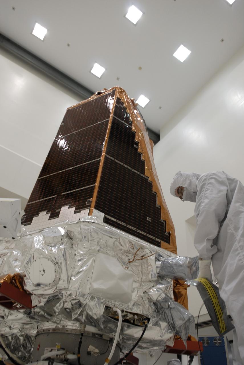 CAPE CANAVERAL, Fla. -- At the Astrotech payload processing facility in Titusville, Fla., NASA's Kepler spacecraft is prepared for testing. A NASA Discovery mission, Kepler is specifically designed to survey our region of the Milky Way galaxy to discover hundreds of Earth-size and smaller planets in or near the habitable zone and determine how many of the billions of stars in our galaxy have such planets. Results from this mission will allow us to place our solar system within the continuum of planetary systems in the Galaxy. After processing at Astrotech, Kepler will be carried to its launch pad at Cape Canaveral. .NASA's planet-hunting Kepler mission is scheduled to launch no earlier than March 5 atop a Delta II rocket. Photo credit: NASA/Kim Shiflett