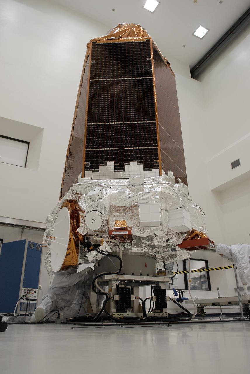 CAPE CANAVERAL, Fla. -- At the Astrotech payload processing facility in Titusville, Fla., NASA's Kepler spacecraft is prepared for testing. A NASA Discovery mission, Kepler is specifically designed to survey our region of the Milky Way galaxy to discover hundreds of Earth-size and smaller planets in or near the habitable zone and determine how many of the billions of stars in our galaxy have such planets. Results from this mission will allow us to place our solar system within the continuum of planetary systems in the Galaxy. After processing at Astrotech, Kepler will be carried to its launch pad at Cape Canaveral. .NASA's planet-hunting Kepler mission is scheduled to launch no earlier than March 5 atop a Delta II rocket. Photo credit: NASA/Kim Shiflett