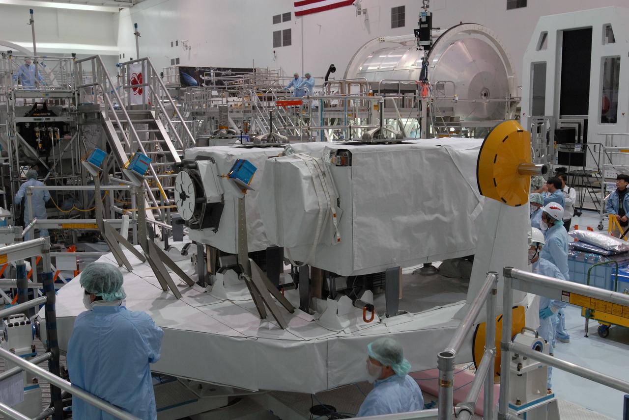 CAPE CANAVERAL, Fla. -- In the Space Station Processing Facility at NASA's Kennedy Space Center in Florida, the MAXI (Monitor of All-sky X-ray Image) has been installed next to the SEDA-AP (Space Environment Data Acquisition Equipment-Attached Payload) on the Japanese Experiment Module's Experiment Logistics Module-Exposed Section, or ELM-ES. The MAXI and SEDA-AP are part of space shuttle Endeavour's payload on the STS-127 mission. Using X-ray slit cameras with high sensitivity, the MAXI will continuously monitor astronomical X-ray objects over a broad energy band (0.5 to 30 keV). Endeavour is targeted to launch May 15. Photo credit: NASA/Jim Grossmann