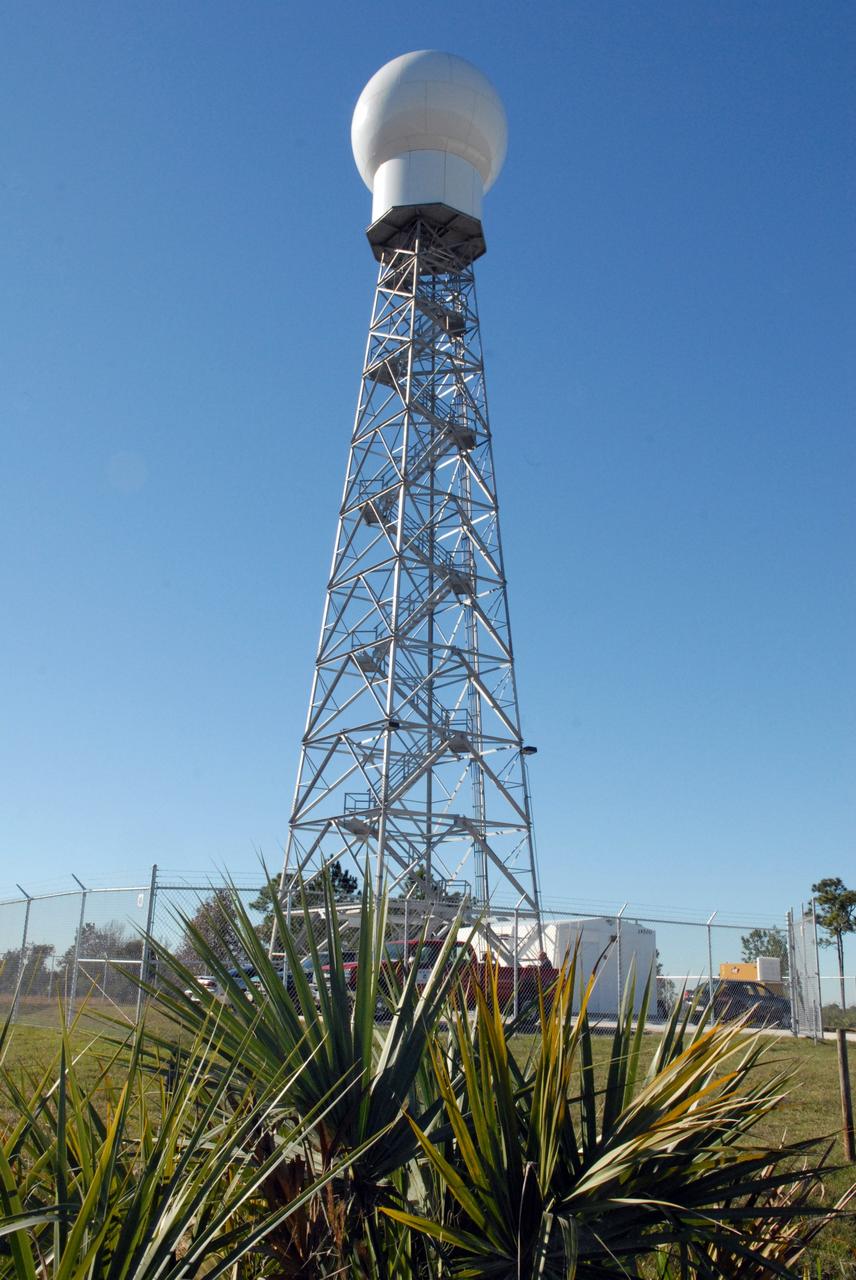 CAPE CANAVERAL, Fla. -- A replacement weather Doppler radar has been installed on top of this tower in a remote field located west of NASA's Kennedy Space Center in Florida. The radome houses the rotating antenna and pedestal and protects them from the elements. The tower is 100 feet high; the radome is 22 feet in diameter, the antenna 14 feet in diameter. It rotates at 6 rpm. The structure can withstand 130 mph winds. It is undergoing initial testing and expected to become operational in the summer. The weather radar is essential in issuing lightning and other severe weather warnings and vital in evaluating lightning launch commit criteria for space shuttle and rocket launches. Photo credit: NASA/Troy Cryder