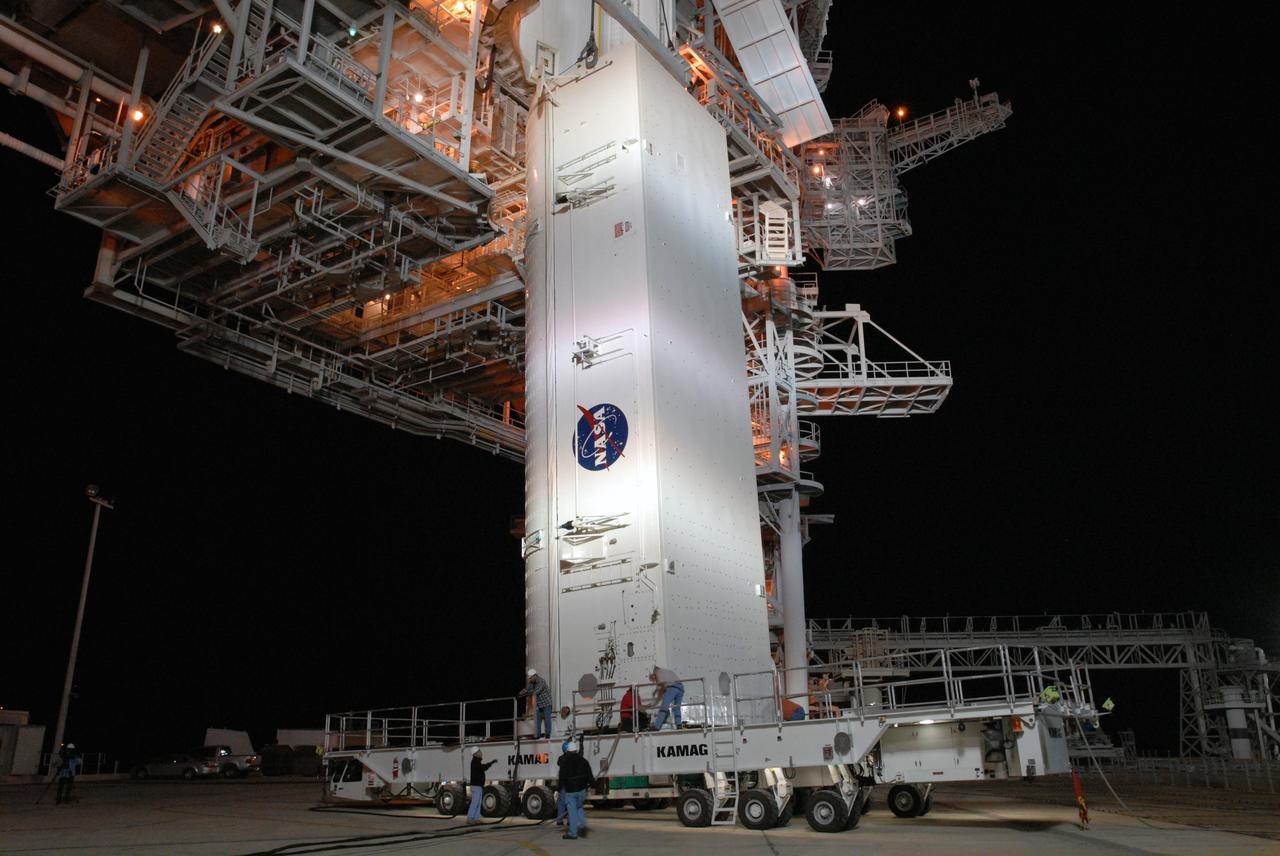 CAPE CANAVERAL, Fla. --  The payload canister containing the S6 truss and solar arrays arrives at Launch Pad 39A at NASA's Kennedy Space Center in Florida. The canister sits below the Payload Changeout Room, or PCR. It will be lifted up to the PCR and space shuttle Discovery's payload transferred inside. After Discovery rolls out to the pad, the payload will be installed in the shuttle's payload bay. Launch of Discovery on the STS-119 mission is scheduled for Feb. 12. During Discovery's 14-day mission, the crew will install the S6 truss segment and its solar arrays to the starboard side of the station, completing the station's backbone, or truss Photo credit: NASA/Jim Grossmann