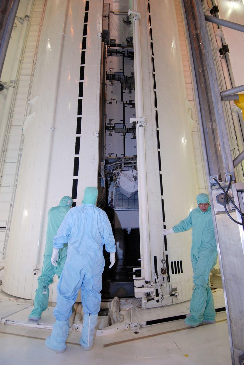 CAPE CANAVERAL, Fla. --  On Launch Pad 39A at NASA's Kennedy Space Center in Florida, the doors of the payload canister are opened to transfer the space shuttle Discovery's payload into the Payload Changeout Room, or PCR. The payload for the STS-119 mission comprises the integrated truss structure S6 and solar arrays to be installed on the International Space Station. They will be installed in Discovery's payload bay after the shuttle rolls out to the launch pad. Launch of Discovery on the STS-119 mission is scheduled for Feb. 12. During Discovery's 14-day mission, the crew will install the S6 truss segment and its solar arrays to the starboard side of the station, completing the station's backbone, or truss. Photo credit: NASA/Chris Rhodes