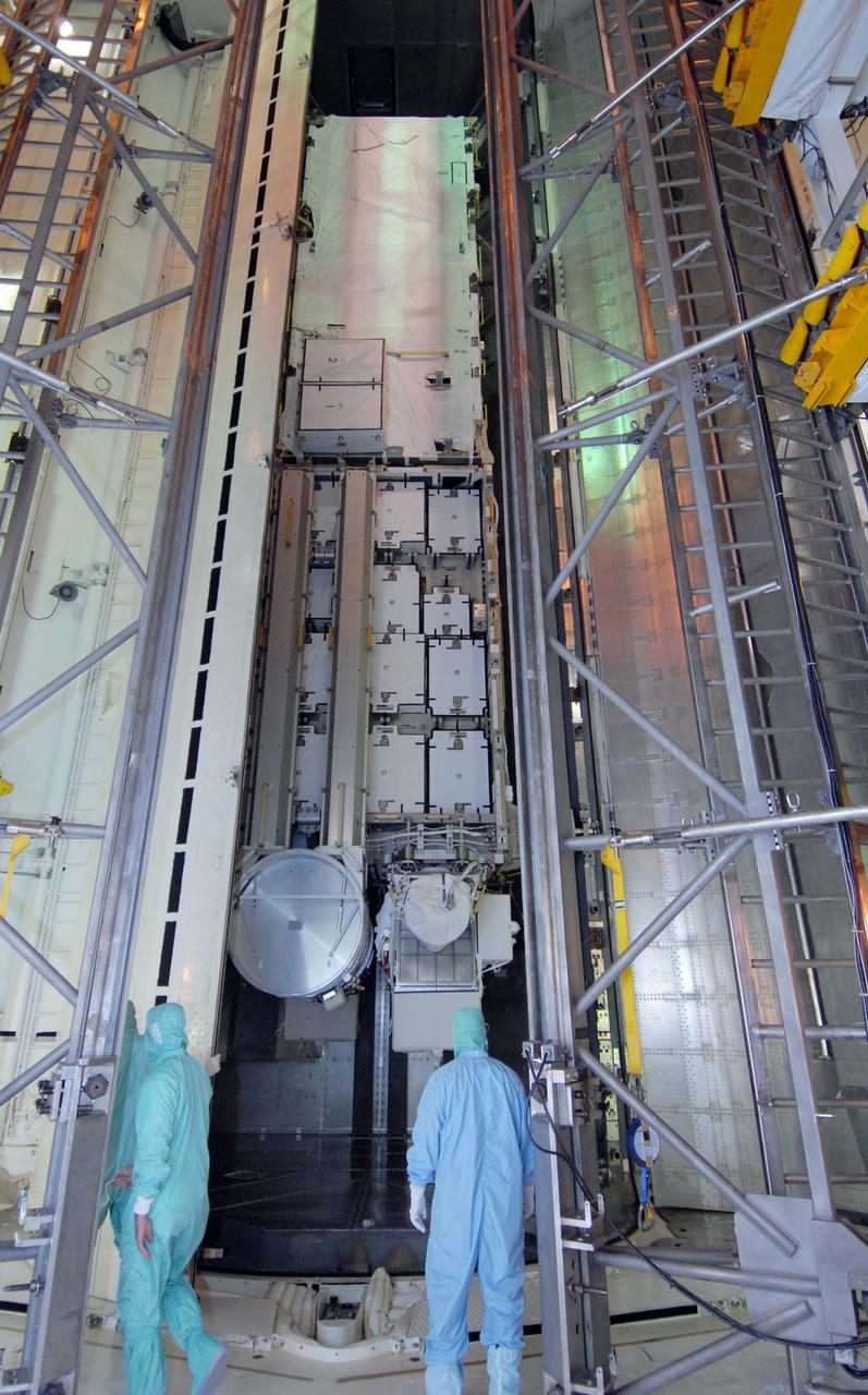 CAPE CANAVERAL, Fla. --  On Launch Pad 39A at NASA's Kennedy Space Center in Florida, the doors of the payload canister open to reveal space shuttle Discovery's payload, the integrated truss structure S6 and solar arrays, for the STS-119 mission. The payload will be transferred into the Payload Changeout Room, or PCR. They will be installed in Discovery's payload bay after the shuttle rolls out to the launch pad. Launch of Discovery on the STS-119 mission is scheduled for Feb. 12. During Discovery's 14-day mission, the crew will install the S6 truss segment and its solar arrays to the starboard side of the station, completing the station's backbone, or truss. Photo credit: NASA/Chris Rhodes