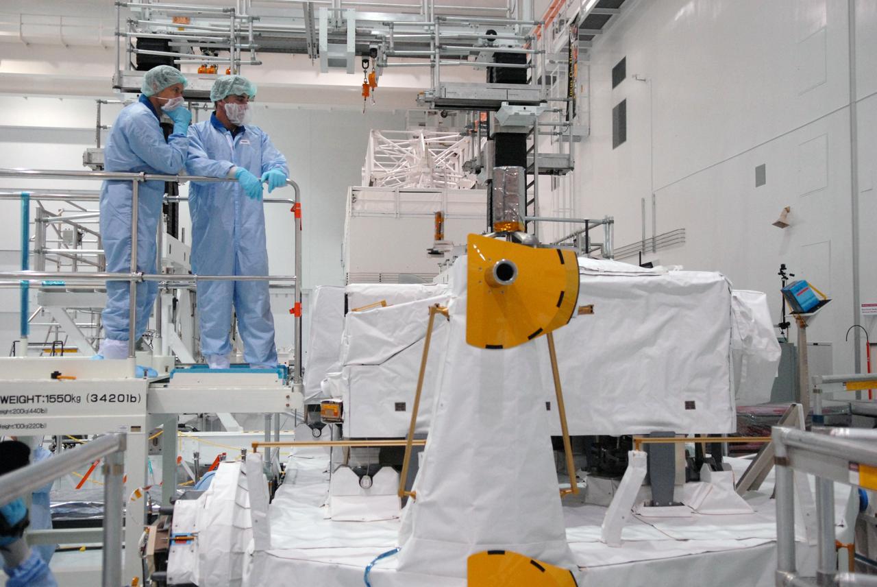 CAPE CANAVERAL, Fla. –  In the Space Station Processing Facility at NASA's Kennedy Space Center in Florida, members of the STS-127 crew look at some of the elements on the Japanese Experiment Module's Experiment Logistics Module-Exposed Section, or ELM-ES.  The crew is  Commander Mark Polansky, Pilot Doug Hurley and Mission Specialists Christopher Cassidy, Tom Marshburn, Dave Wolf, Julie Payette and Tim Kopra. They are at Kennedy for Crew Equipment Interface Test activities, or CEIT, which provides experience handling tools, equipment and hardware for the mission.  The payload will be launched to the International Space Station aboard space shuttle Endeavour on the STS-127 mission, targeted for launch on May 15. Photo credit: NASA/Dimitrios Gerondidakis