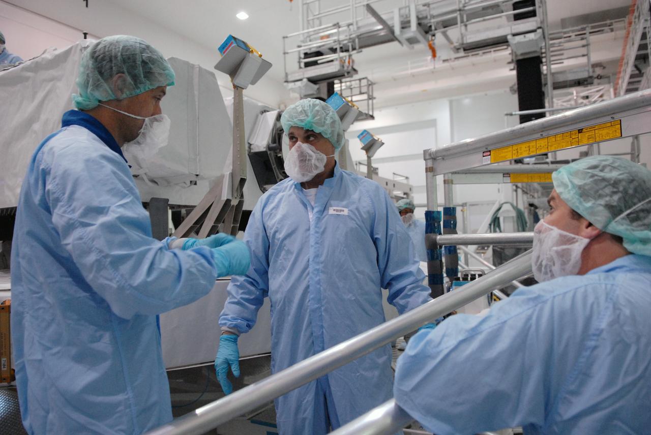 CAPE CANAVERAL, Fla. –  In the Space Station Processing Facility at NASA's Kennedy Space Center in Florida, Mission Specialists Tom Marshburn and Dave Wolf review their on-orbit task to install and make the JEM Exposed Facility operational. Other crew members are Commander Mark Polansky, Pilot Doug Hurley and Mission Specialists Christopher Cassidy, Julie Payette and Tim Kopra. They are at Kennedy for Crew Equipment Interface Test activities, or CEIT, which provides experience handling tools, equipment and hardware for the mission.  The payload will be launched to the International Space Station aboard space shuttle Endeavour on the STS-127 mission, targeted for launch on May 15. Photo credit: NASA/Dimitrios Gerondidakis