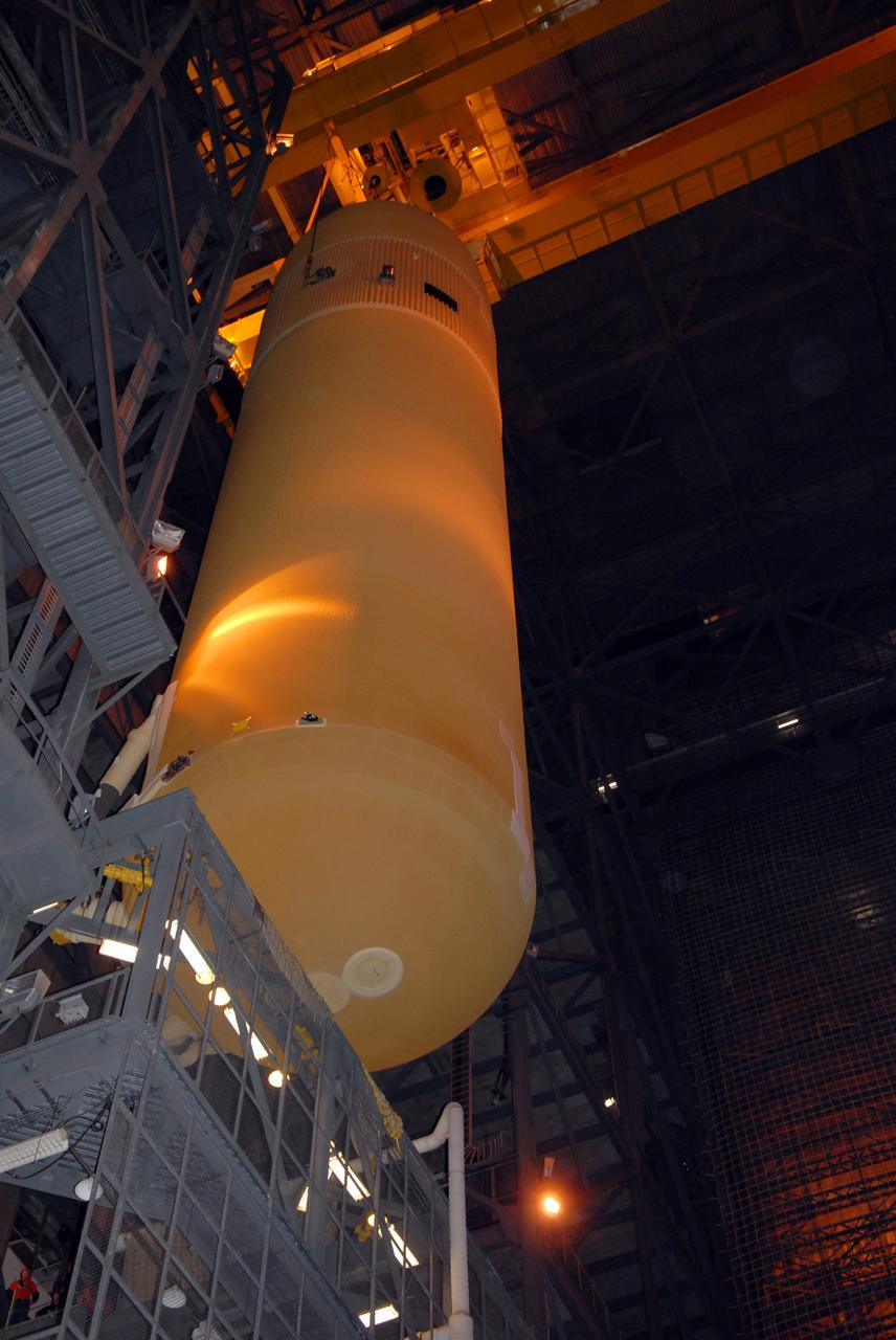 CAPE CANAVERAL, Fla. –  In the Vehicle Assembly Building at NASA's Kennedy Space Center in Florida, the external fuel tank for space shuttle Atlantis' STS-125 mission is moved out of the checkout cell.  The tank will be lowered into high bay 3 onto the mobile launcher platform and attached to the solid rocket boosters already installed. Atlantis' STS-125 mission is the fifth and final shuttle servicing mission to NASA’s Hubble Space Telescope.  Launch is targeted for May 12.  Photo credit: NASA/Jack Pfaller