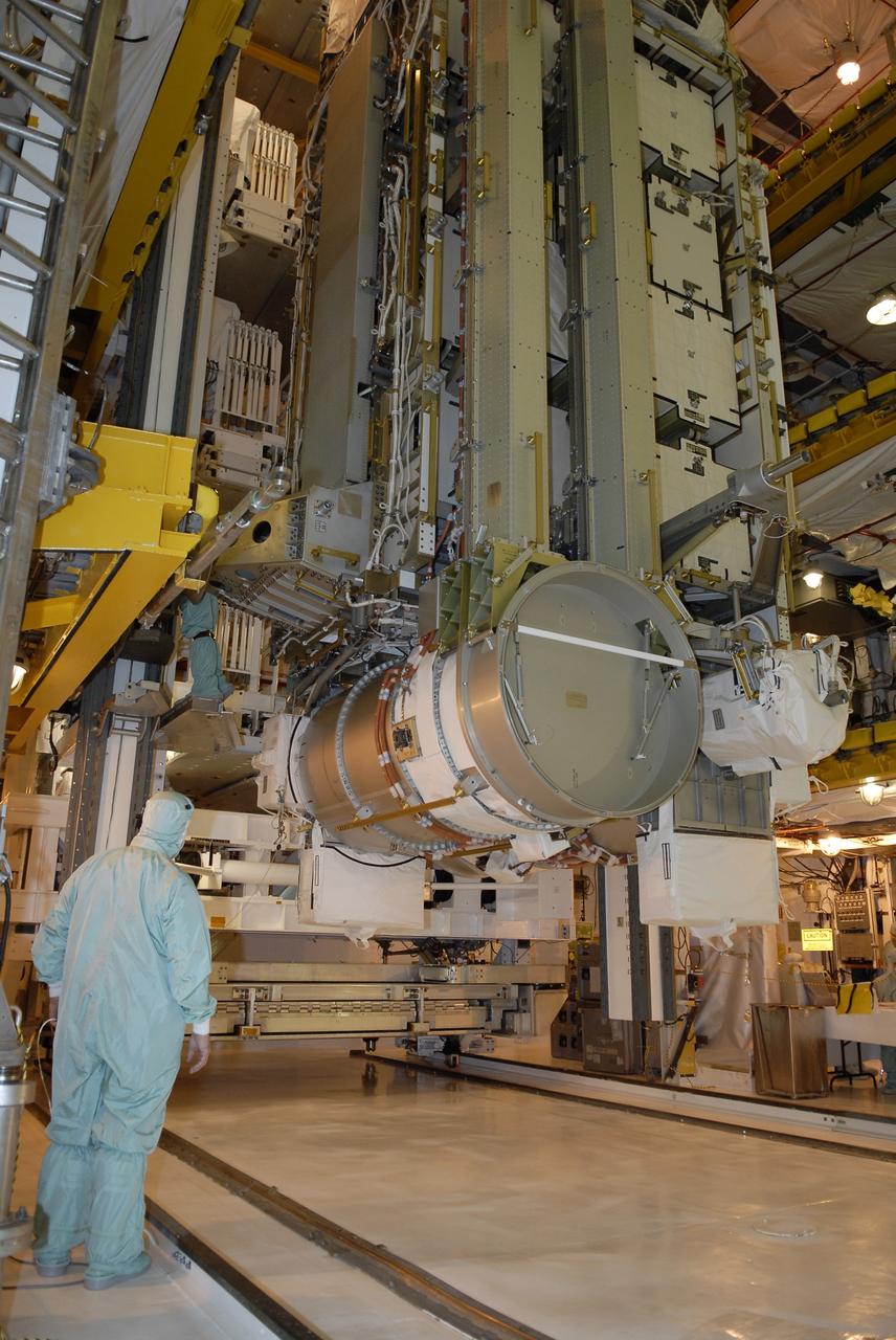 CAPE CANAVERAL, Fla. – In the Payload Changeout Room on Launch Pad 39A at NASA's Kennedy Space Center in Florida, the payload for the STS-119 mission is being transferred to space shuttle Discovery's cargo bay. The payload consists of the integrated truss structure S6 and solar arrays. During Discovery's 14-day mission, the shuttle's seven astronauts will install the S6 truss segment and solar arrays to the starboard side of the International Space Station, completing the station's truss, or backbone. Launch of Discovery on the STS-119 mission is targeted for Feb. 12. Photo credit: NASA/Kim Shiflett