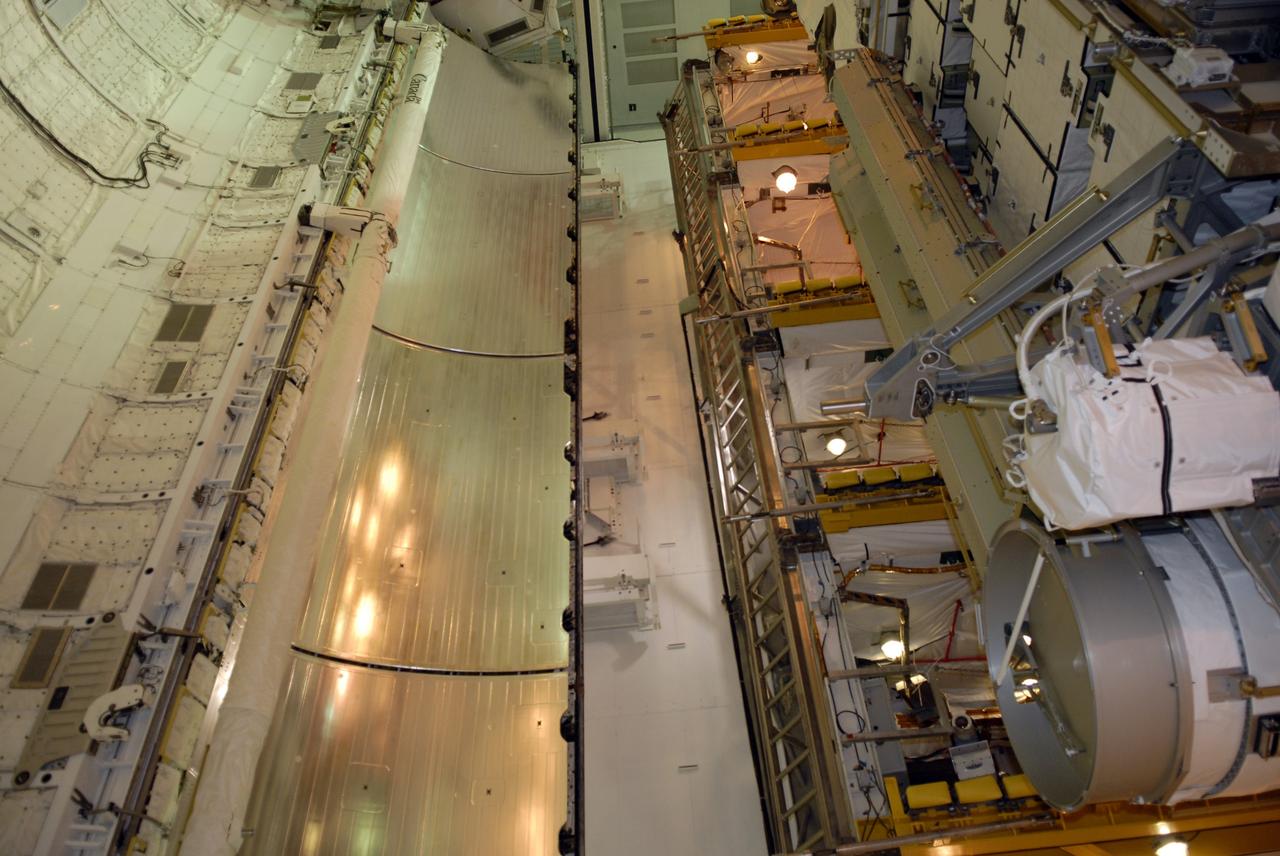 CAPE CANAVERAL, Fla. – In the Payload Changeout Room on Launch Pad 39A at NASA's Kennedy Space Center in Florida, the payload for the STS-119 mission is being transferred to space shuttle Discovery's cargo bay. The payload consists of the integrated truss structure S6 and solar arrays. During Discovery's 14-day mission, the shuttle's seven astronauts will install the S6 truss segment and solar arrays to the starboard side of the International Space Station, completing the station's truss, or backbone. Launch of Discovery on the STS-119 mission is targeted for Feb. 12. Photo credit: NASA/Kim Shiflett