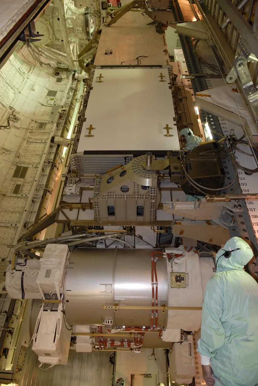 CAPE CANAVERAL, Fla. – On Launch Pad 39A at NASA's Kennedy Space Center in Florida, the payload for the STS-119 mission is installed in space shuttle Discovery's cargo bay. The payload consists of the integrated truss structure S6 and solar arrays. During Discovery's 14-day mission, the shuttle's seven astronauts will install the S6 truss segment and solar arrays to the starboard side of the International Space Station, completing the station's truss, or backbone. Launch of Discovery on the STS-119 mission is targeted for Feb. 12. Photo credit: NASA/Kim Shiflett