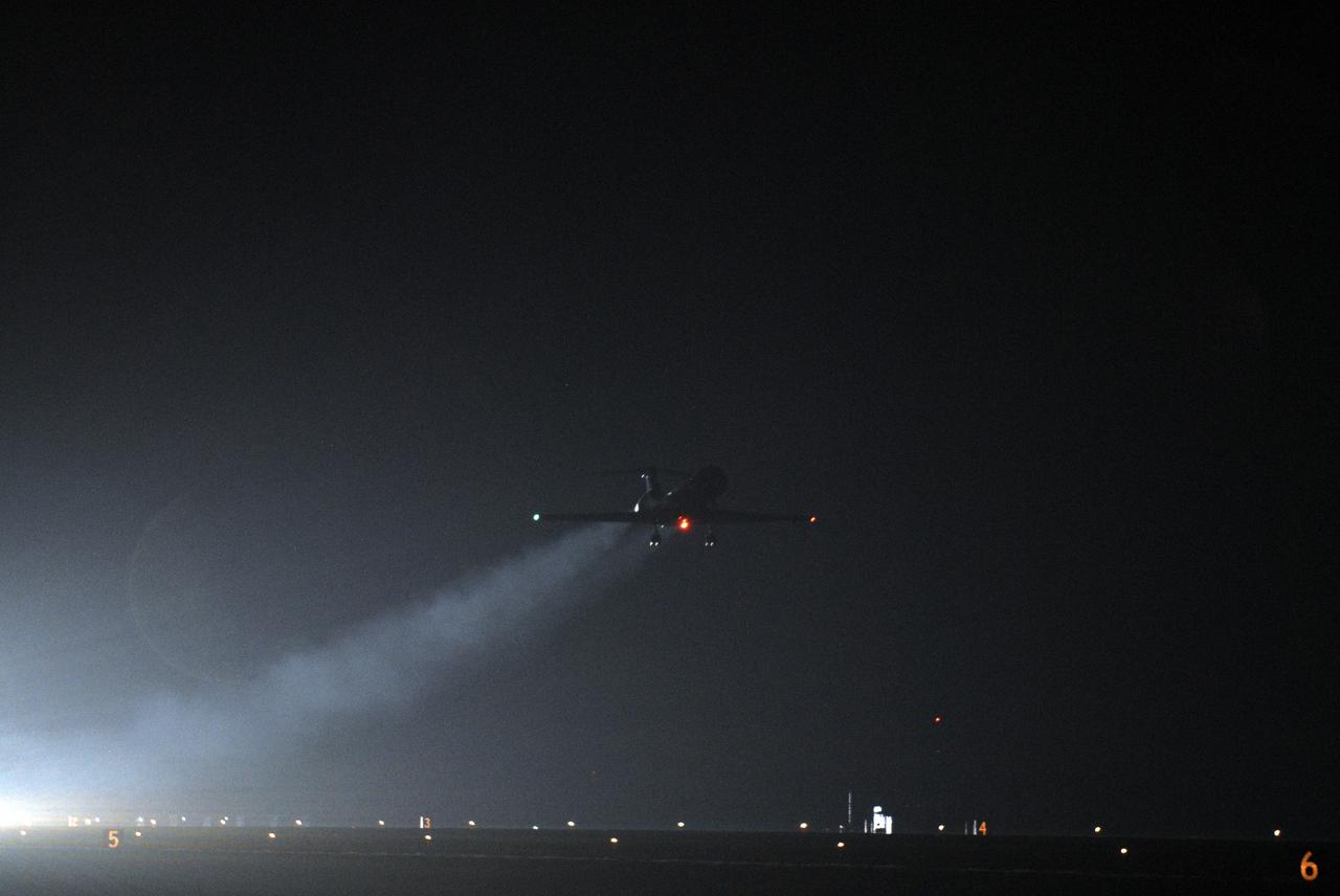 CAPE CANAVERAL, Fla. –  From the Shuttle Landing Facility at NASA's Kennedy Space Center in Florida, a shuttle training aircraft takes off into the night sky. STS-119 Commander Lee Archambault and Pilot Tony Antonelli are practicing shuttle landings as part of the Terminal Countdown Demonstration Test activities. The TCDT includes equipment familiarization and a simulated launch countdown. The STA is a Grumman American Aviation-built Gulf Stream II jet that was modified to simulate a shuttle’s cockpit, motion and visual cues, and handling qualities. In flight, the aircraft duplicates the shuttle’s atmospheric descent trajectory from approximately 35,000 feet to landing. The crew of space shuttle Discovery is targeted to launch on the STS-119 mission Feb. 12. During Discovery's 14-day mission, the crew will install the S6 truss segment and solar arrays to the starboard side of the International Space Station, completing the station's truss, or backbone.   Photo credit: NASA/Kim Shiflett