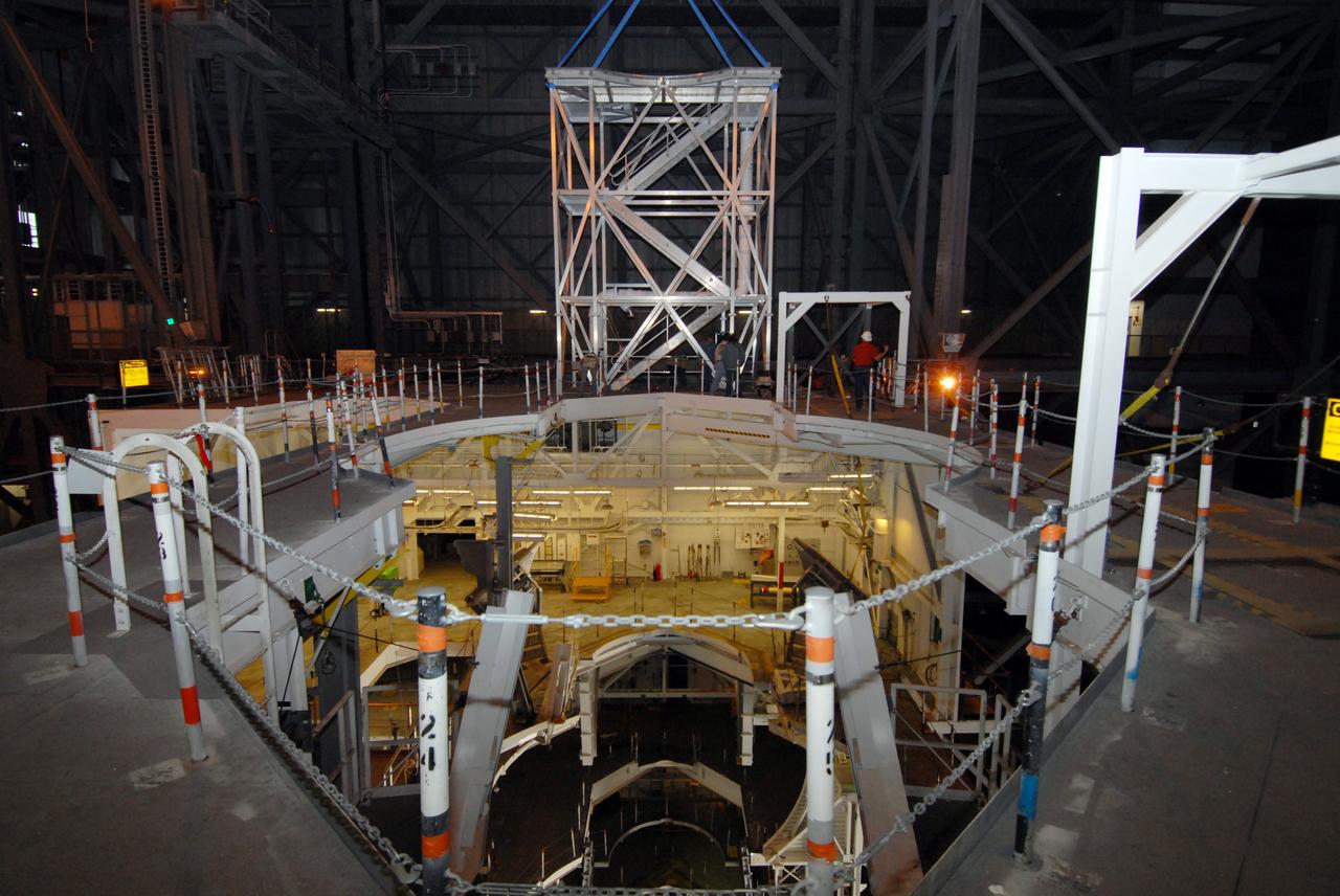 CAPE CANAVERAL, Fla. –   In the Vehicle Assembly Building at NASA's Kennedy Space Center in Florida, a new platform is installed on the 16th level in high bay 3. The refurbishment of the facility is for the Constellation Program's Ares vehicles.  The Ares I and Ares V rockets will be 325 feet and 360 feet tall, respectively, considerably taller than the space shuttle atop its mobile launcher platform.   Photo credit: NASA/Jack Pfaller