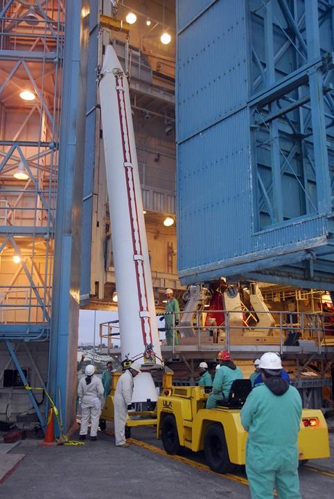 VANDENBERG AIR FORCE BASE, Calif. –    On Space Launch Complex 2 at Vandenberg Air Force Base in California, a solid rocket booster is raised to vertical.  The booster will be lifted into the service tower and installed on the Delta II rocket for the NOAA-N Prime satellite. NOAA-N Prime is the latest polar-orbiting operational environmental weather satellite developed by NASA for the National Oceanic and Atmospheric Administration.  It is built by Lockheed Martin and similar to NOAA-N launched on May 20, 2005. Launch of NOAA-N Prime is scheduled for Feb. 4.   Photo credit: NASA/Joe Davila, VAFB