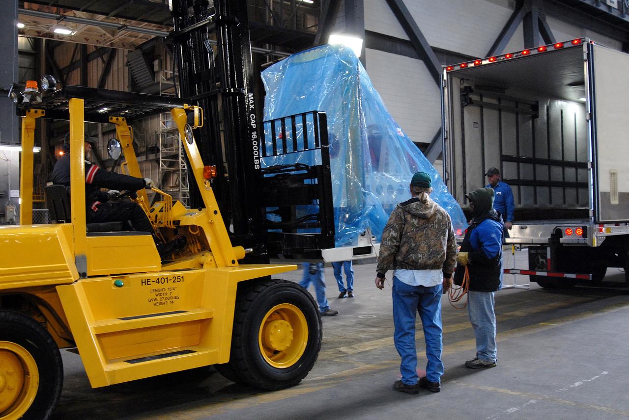 CAPE CANAVERAL, Fla. – The Ares I-X roll control system module arrives in the Vehicle Assembly Building at NASA's Kennedy Space Center in Florida. The system is designed to perform a 90-degree roll after the rocket clears the launch tower, preventing a roll during flight and maintaining the orientation of the rocket until separation of the upper and first stages. Part of the upper stage simulator, the system module is composed to two modules and four thrusters. The system module will return to earth and splash down; it will not be recovered. Ares I-X is the test vehicle for the Ares I, which is part of the Constellation Program to return men to the moon and beyond. Ares I is the essential core of a safe, reliable, cost-effective space transportation system that eventually will carry crewed missions back to the moon, on to Mars and out into the solar system. Ares I-X is targeted for launch in July 2009. Photo credit: NASA/Jack Pfaller