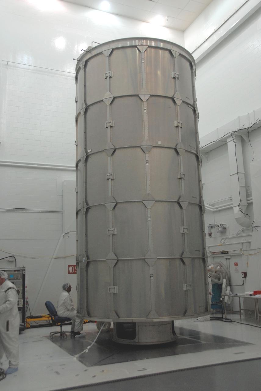 VANDENBERG AIR FORCE BASE, Calif. --  A transportation canister surrounds the NOAA-N Prime spacecraft in Bldg. 1610 at Vandenberg Air Force Base in California.  The spacecraft will be moved to a transporter. NOAA-N Prime is the latest polar-orbiting operational environmental weather satellite developed by NASA for the National Oceanic and Atmospheric Administration.  The satellite is scheduled to launch Feb. 4 aboard a Delta II rocket from Vandenberg Air Force Base. Photo credit: NASA/ Daniel Liberotti, VAFB