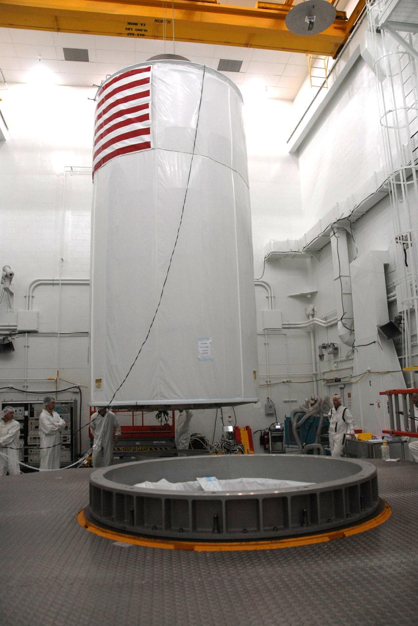 VANDENBERG AIR FORCE BASE, Calif. --   In Bldg. 1610 at Vandenberg Air Force Base in California, the covered NOAA-N Prime spacecraft is lifted off its stand.  It will be moved to a transporter. NOAA-N Prime is the latest polar-orbiting operational environmental weather satellite developed by NASA for the National Oceanic and Atmospheric Administration.  The satellite is scheduled to launch Feb. 4 aboard a Delta II rocket from Vandenberg Air Force Base. Photo credit: NASA/ Daniel Liberotti, VAFB