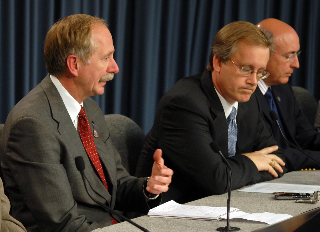 CAPE CANAVERAL, Fla. – At a media conference following the day-long Flight Readiness Review of space shuttle Discovery for the STS-119 mission, NASA's Associate Administrator for Space Operations William H. Gerstenmaier (left) responds to a question. At right are NASA's Space Shuttle Program Manager John Shannon and Program Manager for the International Space Station Mike Suffredini. NASA managers decided to plan a launch no earlier than Feb. 19, pending additional analysis and particle impact testing associated with a flow control valve in the shuttle's main engine system. Photo credit: NASA/Cory Huston