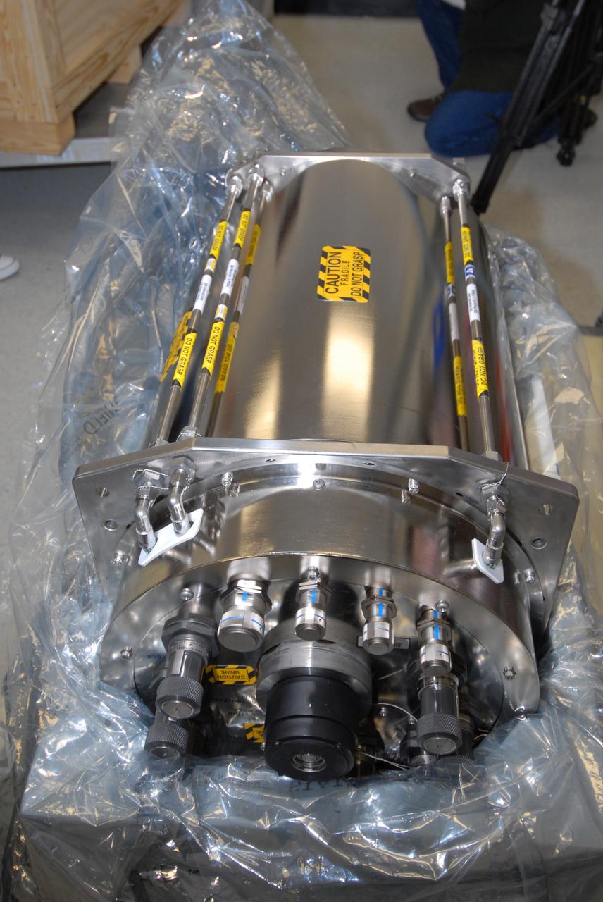 CAPE CANAVERAL, Fla. –  A closeup of the replacement distillation assembly for the International Space Station's new water recycling system being checked out in the Space Station Processing Facility at NASA's Kennedy Space Center in Florida. The unit is part of the Urine Processing Assembly that removes impurities from urine in an early stage of the recycling process.  It will be flown to the station aboard space shuttle Discovery on the STS-119 mission.  Photo credit: NASA/Jack Pfaller