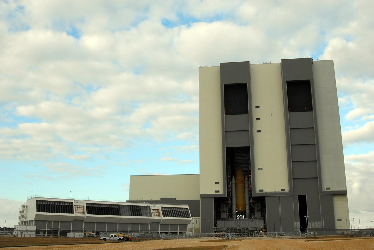 CAPE CANAVERAL, Fla. –  The doors of the Vehicle Assembly Building at NASA's Kennedy Space Center open to reveal space shuttle Atlantis' external fuel tank-solid rocket booster stack in high bay 1.  The stack on the mobile launcher platform will be moved to high bay 3 to make room for the ET-SRB stack for space shuttle Endeavour. Atlantis is targeted for launch on the STS-125 mission on May 12 to service NASA's Hubble Space Telescope.  Endeavour will fly on the STS-127 mission to the International Space Station and bring the final segments for Japan's Kibo laboratory. Photo credit: NASA/Tim Jacobs