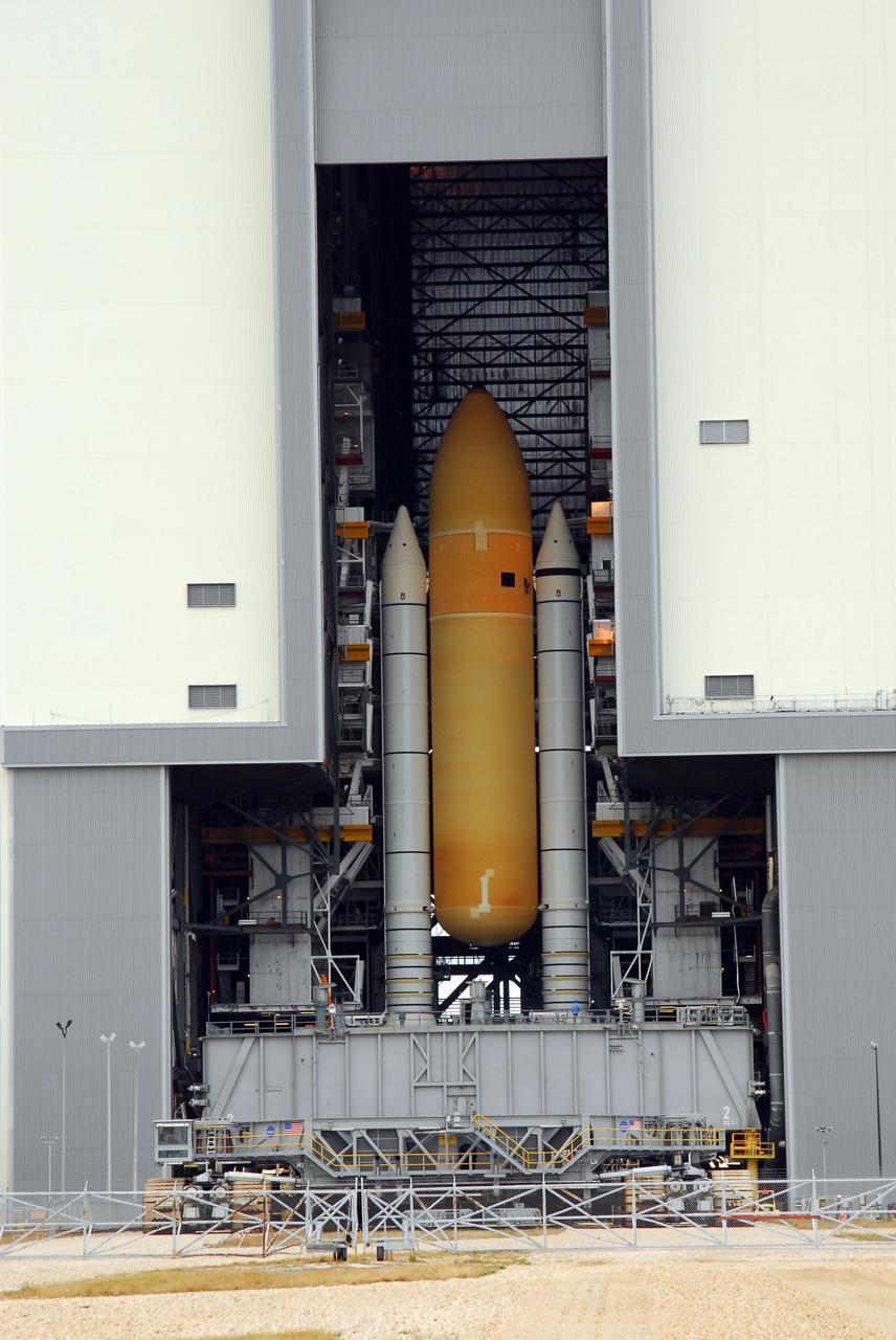 CAPE CANAVERAL, Fla. –  The doors of the Vehicle Assembly Building at NASA's Kennedy Space Center open to reveal space shuttle Atlantis' external fuel tank-solid rocket booster stack in high bay 1.  The stack on the mobile launcher platform will be moved to high bay 3 to make room for the ET-SRB stack for space shuttle Endeavour.  Atlantis is targeted for launch on the STS-125 mission on May 12 to service NASA's Hubble Space Telescope.  Endeavour will fly on the STS-127 mission to the International Space Station and bring the final segments for Japan's Kibo laboratory. Photo credit: NASA/Tim Jacobs