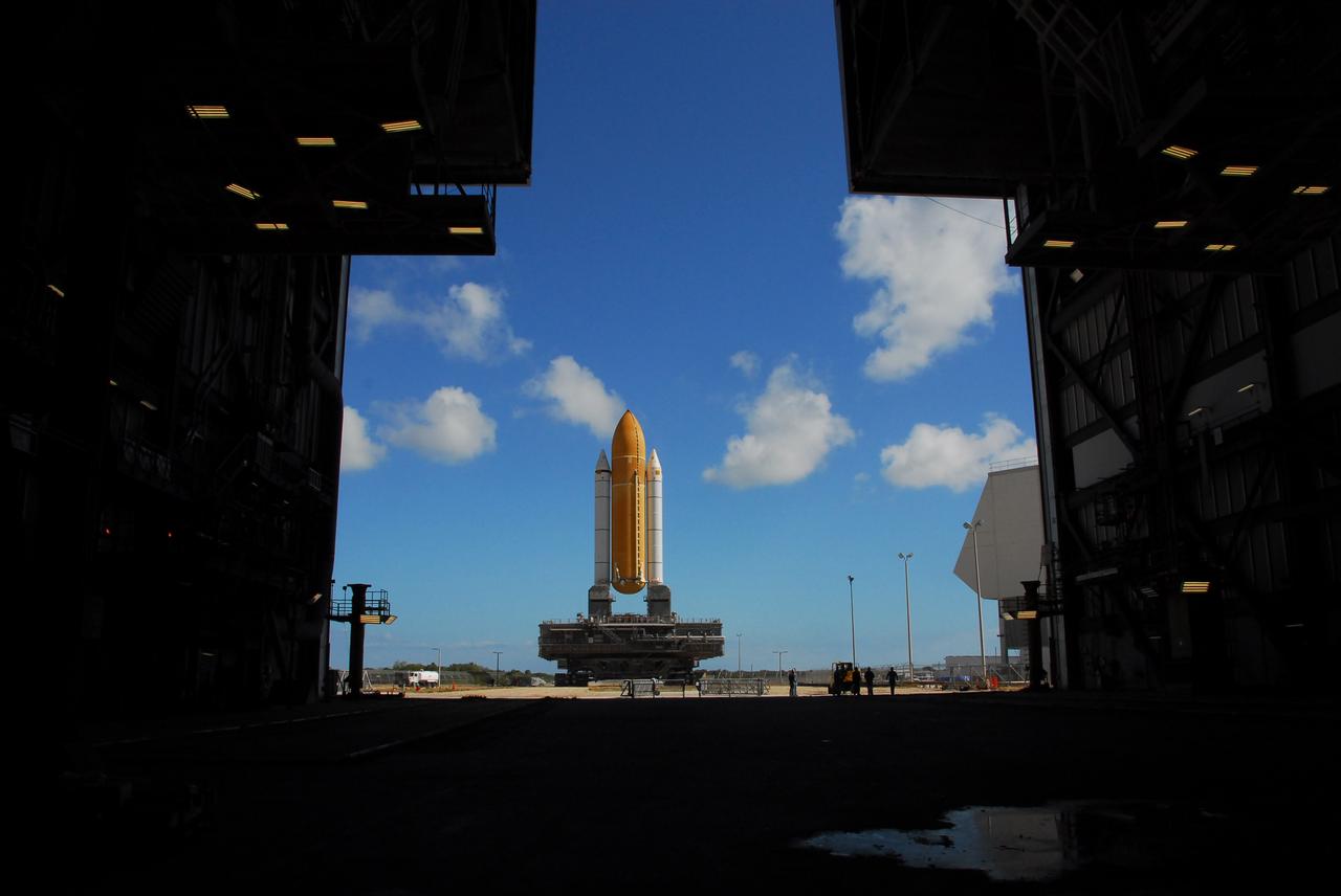 CAPE CANAVERAL, Fla. –  Space shuttle Atlantis' external fuel tank-solid rocket booster stack, atop a mobile launcher platform, has been rolled out of high bay 1 in the Vehicle Assembly Building at NASA's Kennedy Space Center. It is being moved to high bay 3 to make room for the ET-SRB stack for space shuttle Endeavour.  Atlantis is targeted for launch on the STS-125 mission on May 12 to service NASA's Hubble Space Telescope.  Endeavour will fly on the STS-127 mission to the International Space Station and bring the final segments for Japan's Kibo laboratory. Photo credit: NASA/Tim Jacobs