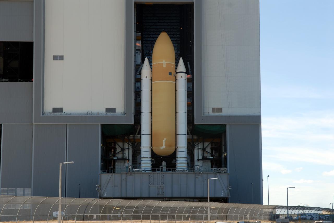 CAPE CANAVERAL, Fla. –  After moving out of high bay 1 in the Vehicle Assembly Building at NASA's Kennedy Space Center, space shuttle Atlantis' external fuel tank-solid rocket booster stack, atop a mobile launcher platform, rolls into high bay 3.  The move makes room in high bay 1 for the ET-SRB stack for space shuttle Endeavour.  Atlantis is targeted for launch on the STS-125 mission on May 12 to service NASA's Hubble Space Telescope.  Endeavour will fly on the STS-127 mission to the International Space Station and bring the final segments for Japan's Kibo laboratory. Photo credit: NASA/Dimitri Gerondidakis