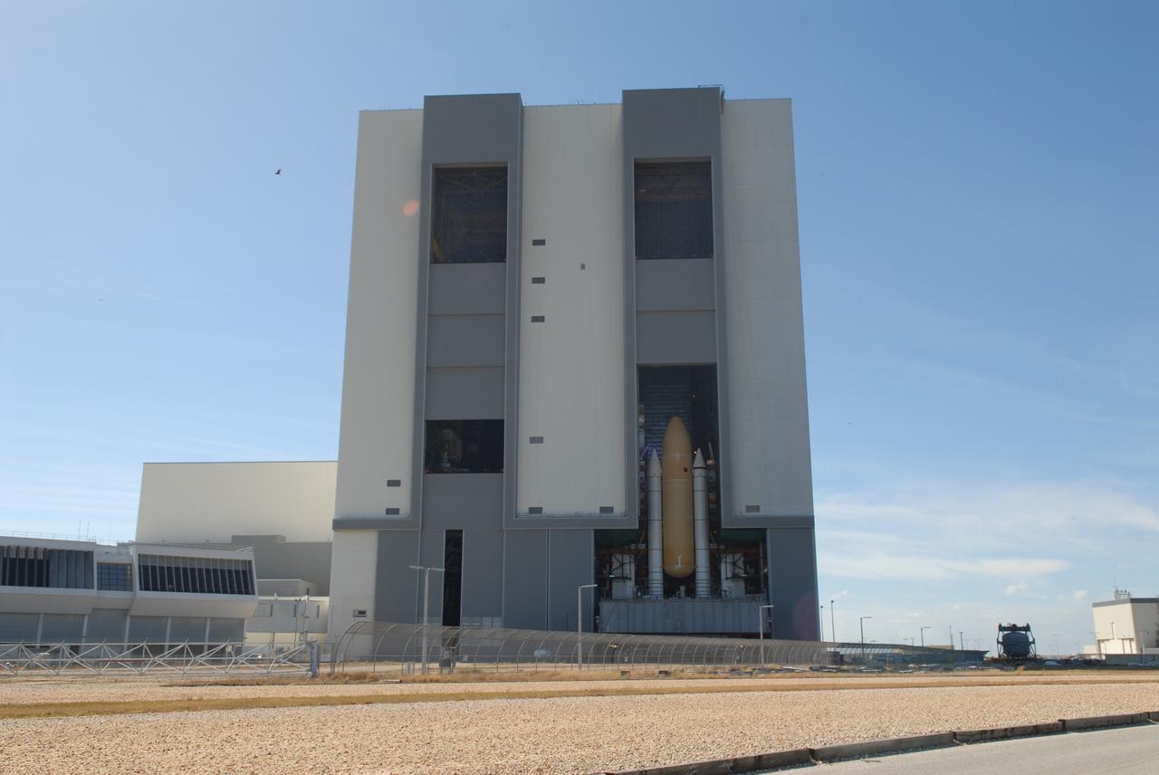 CAPE CANAVERAL, Fla. –  Space shuttle Atlantis' external fuel tank-solid rocket booster stack, atop a mobile launcher platform, rolls through the doors of the Vehicle Assembly Building at NASA's Kennedy Space Center into high bay 3. The ET/SRB stack was moved from high bay 1 to make room for the ET-SRB stack for space shuttle Endeavour.  Atlantis is targeted for launch on the STS-125 mission on May 12 to service NASA's Hubble Space Telescope.  Endeavour will fly on the STS-127 mission to the International Space Station and bring the final segments for Japan's Kibo laboratory. Photo credit: NASA/Dimitri Gerondidakis