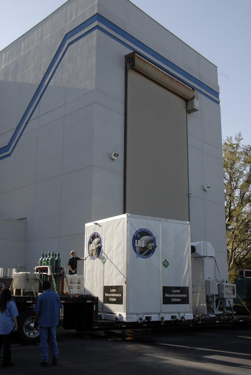 CAPE CANAVERAL, Fla. – NASA's Lunar Reconnaissance Orbiter, or LRO, spacecraft completes its journey to NASA's Kennedy Space Center in Florida.  The spacecraft was built by engineers at Goddard Space Flight Center, where it recently completed two months of tests in a thermal vacuum chamber. The orbiter will carry seven instruments to provide scientists with detailed maps of the lunar surface and enhance our understanding of the moon's topography, lighting conditions, mineralogical composition and natural resources. Information gleaned from LRO will be used to select safe landing sites, determine locations for future lunar outposts and help mitigate radiation dangers to astronauts. The polar regions of the moon are the main focus of the mission because continuous access to sunlight may be possible and water ice may exist in permanently shadowed areas of the poles.  Accompanying LRO on its journey to the moon will be the Lunar Crater Observation and Sensing Satellite, or LCROSS, a mission that will impact the lunar surface in its search for water ice.  Launch of LRO is targeted for April 24.  Photo credit: NASA/Kim Shiflett