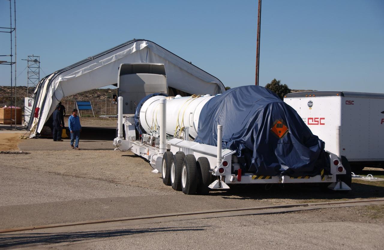 VANDENBERG AIR FORCE BASE, Calif. -- Stages 1, 2 and 3 of Orbital Sciences’ Taurus XL launch vehicle for NASA’s Orbiting Carbon Observatory, or OCO, arrive at Space Launch Complex 576-E at Vandenberg Air Force Base in California. The OCO is an Earth-orbiting mission sponsored by NASA's Earth System Science Pathfinder Program. The observatory will collect precise global measurements of carbon dioxide in the Earth's atmosphere. Scientists will analyze the data returned to better understand the natural processes and human activities that regulate the abundance and distribution of this important greenhouse gas.  Launch is targeted for 1:51:30 a.m. PST Feb. 24. Photo credit: VAFB