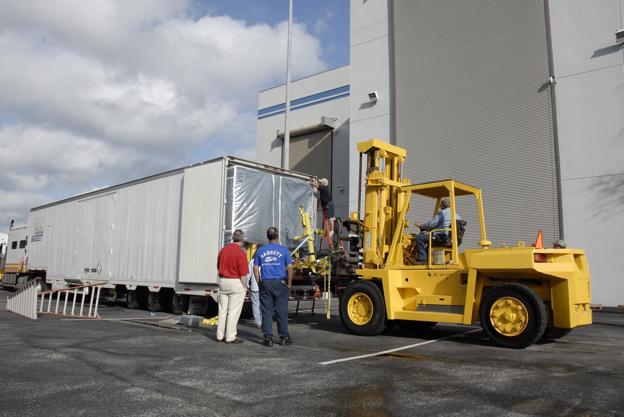 CAPE CANAVERAL, Fla. – NASA's Lunar CRater Observation and Sensing Satellite, known as LCROSS, arrives from Northrop Grumman's facility in Redondo Beach, Calif., at Astrotech near NASA's Kennedy Space Center in preparation for a spring launch. The satellite's primary mission is to search for water ice on the moon in a permanently shadowed crater near one of the lunar poles. LCROSS is a low-cost, accelerated-development, companion mission to NASA's Lunar Reconnaissance Orbiter, or LRO. At Kennedy, the two spacecraft will be integrated with an Atlas V launch vehicle and tested for final flight worthiness. LCROSS and LRO are the first missions in NASA's plan to return humans to the moon and begin establishing a lunar outpost by 2020. Photo credit: NASA/Kim Shiflett