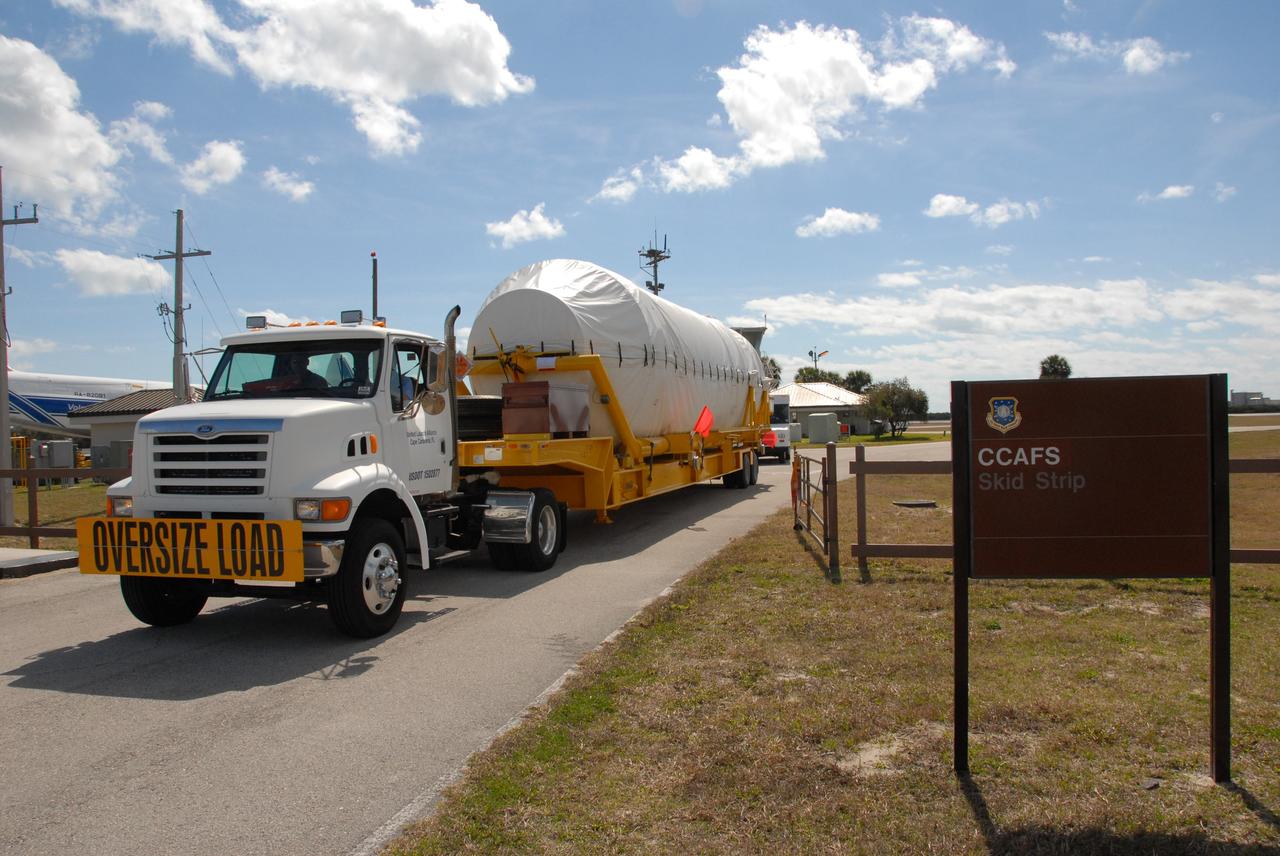 CAPE CANAVERAL, Fla. – The Centaur stage of the Atlas V rocket is transported off Cape Canaveral Air Force Station's skid strip in Florida on its way to the Astrotech facility in Titusville, Fla. The Atlas V will launch NASA's Lunar Reconnaissance Orbiter, or LRO, and NASA's Lunar CRater Observation and Sensing Satellite, known as LCROSS. The two spacecraft will be integrated with the Atlas V and tested for final flight worthiness. Launch is scheduled for the spring. LCROSS and LRO are the first missions in NASA's plan to return humans to the moon and begin establishing a lunar outpost by 2020. Photo credit: NASA/Cory Huston