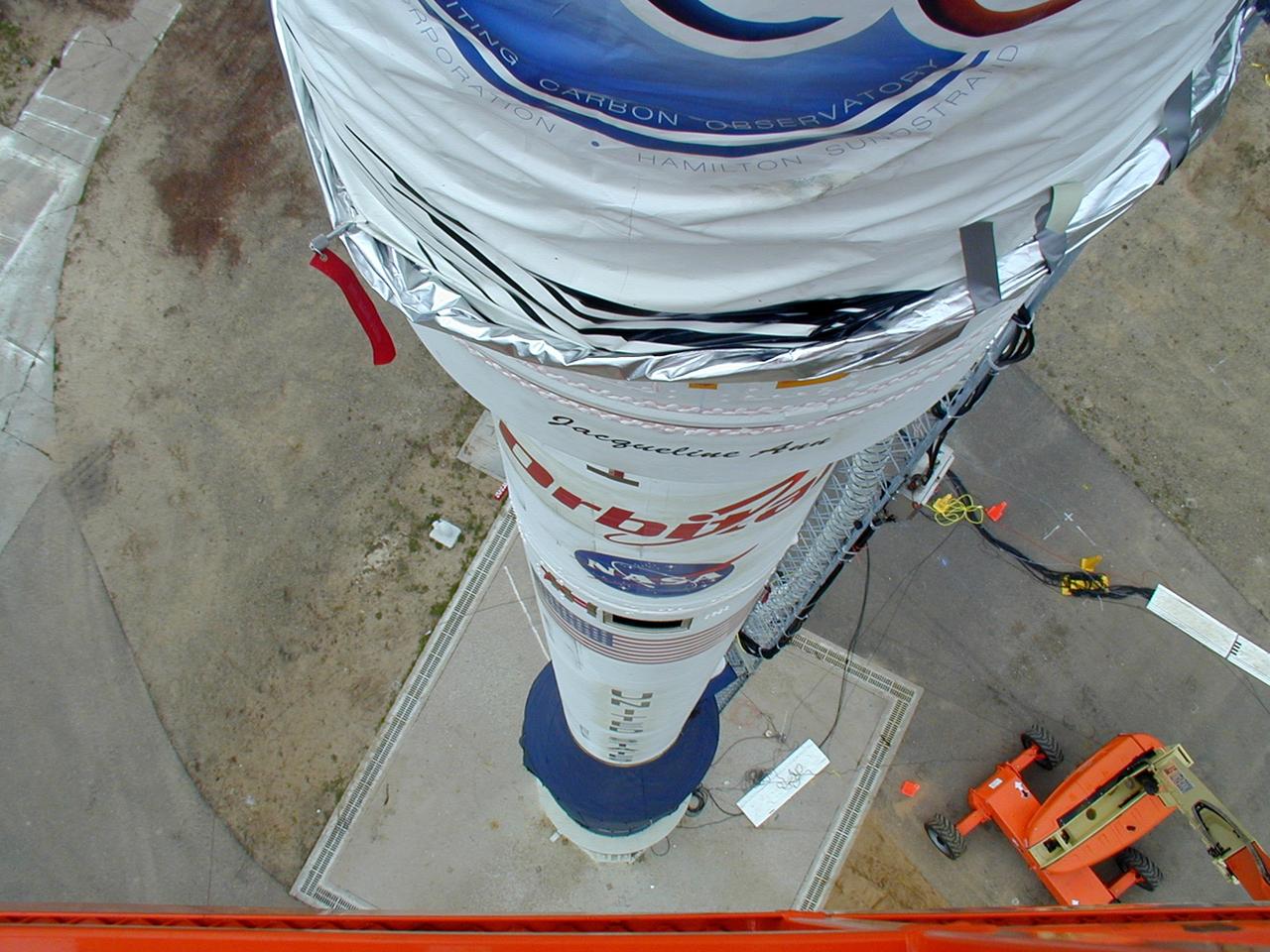 VANDENBERG AIR FORCE BASE, Calif. -- On Launch Complex 576-E at Vandenberg Air Force Base in California, NASA's Orbiting Carbon Observatory, or OCO, atop Orbital Sciences' Taurus XL rocket has been erected for launch.  Around the spacecraft's fairing, at top, is the non-flight environmental shield that will be removed before launch. OCO is scheduled for launch the Taurus rocket Feb. 24 from Vandenberg. The spacecraft will collect precise global measurements of carbon dioxide (CO2) in the Earth's atmosphere. Scientists will analyze OCO data to improve our understanding of the natural processes and human activities that regulate the abundance and distribution of this important greenhouse gas.  Photo courtesy of Brett Gladish, Orbital Sciences  The two spacecraft will be integrated with the Atlas V and tested for final flight worthiness. Launch is scheduled for the spring.  LCROSS and LRO are the first missions in NASA's plan to return humans to the moon and begin establishing a lunar outpost by 2020. Photo courtesy of Glenn Weigle, Orbital Sciences
