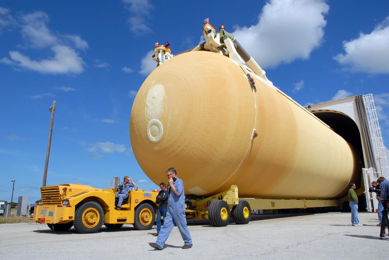 CAPE CANAVERAL, Fla. – At the turn basin at NASA's Kennedy Space Center in Florida, external fuel tank ET-131 is moved out of the Pegasus barge. The tank, which will be used on the STS-127 mission, will be transported to a high bay in the Vehicle Assembly Building for checkout. The Japanese Experiment Module's Experiment Logistics Module-Exposed Section, or ELM-ES, is part of the payload on the STS-127 mission, targeted for launch in June. Photo credit: NASA/Tim Jacobs