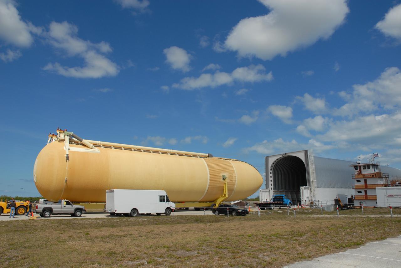 CAPE CANAVERAL, Fla. – At the turn basin at NASA's Kennedy Space Center in Florida, external fuel tank ET-131 has been moved out of the Pegasus barge. The tank, which will be used on the STS-127 mission, will be transported to a high bay in the Vehicle Assembly Building for checkout. The Japanese Experiment Module's Experiment Logistics Module-Exposed Section, or ELM-ES, is part of the payload on the STS-127 mission, targeted for launch in June. Photo credit: NASA/Tim Jacobs