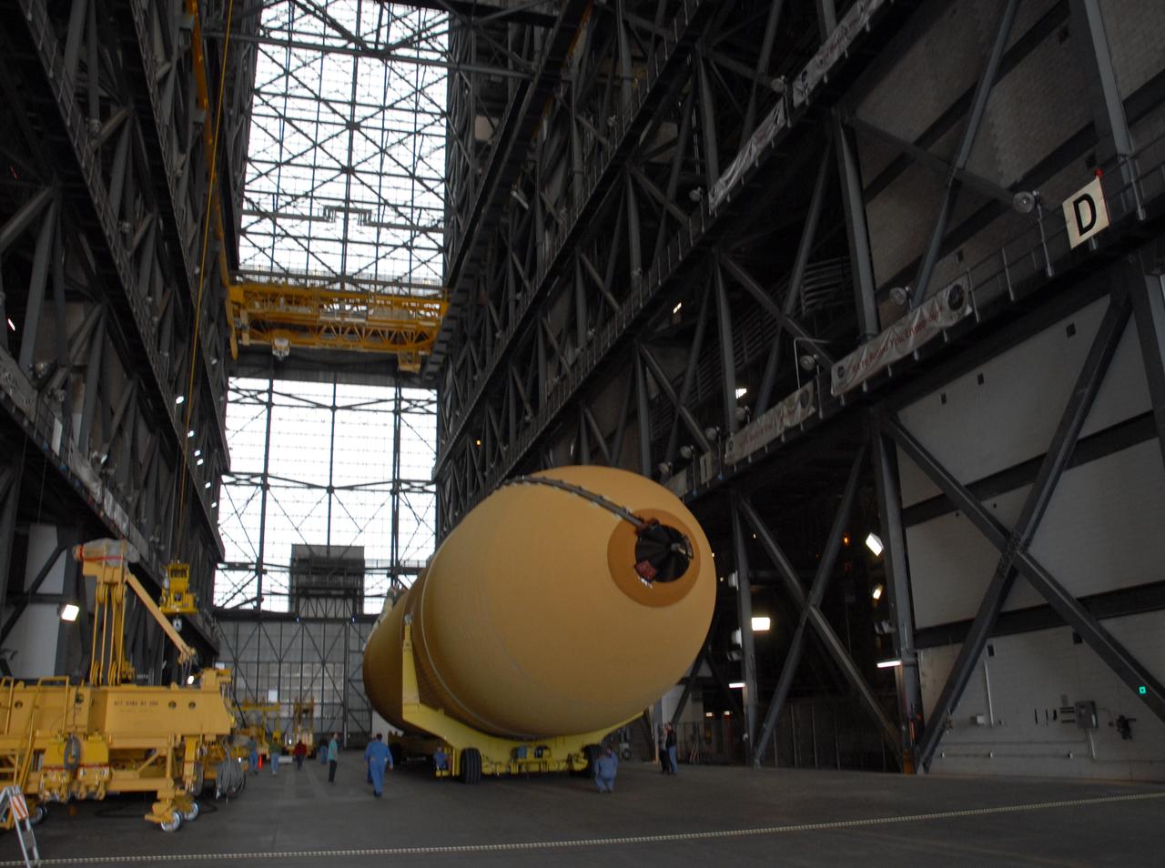 CAPE CANAVERAL, Fla. – At NASA's Kennedy Space Center in Florida, external fuel tank ET-131 moves into the transfer aisle of the Vehicle Assembly Building. The tank, which will be used on the STS-127 mission, will be lifted into a high bay for checkout. The Japanese Experiment Module's Experiment Logistics Module-Exposed Section, or ELM-ES, is part of the payload on the STS-127 mission, targeted for launch in June. Photo credit: NASA/Tim Jacobs