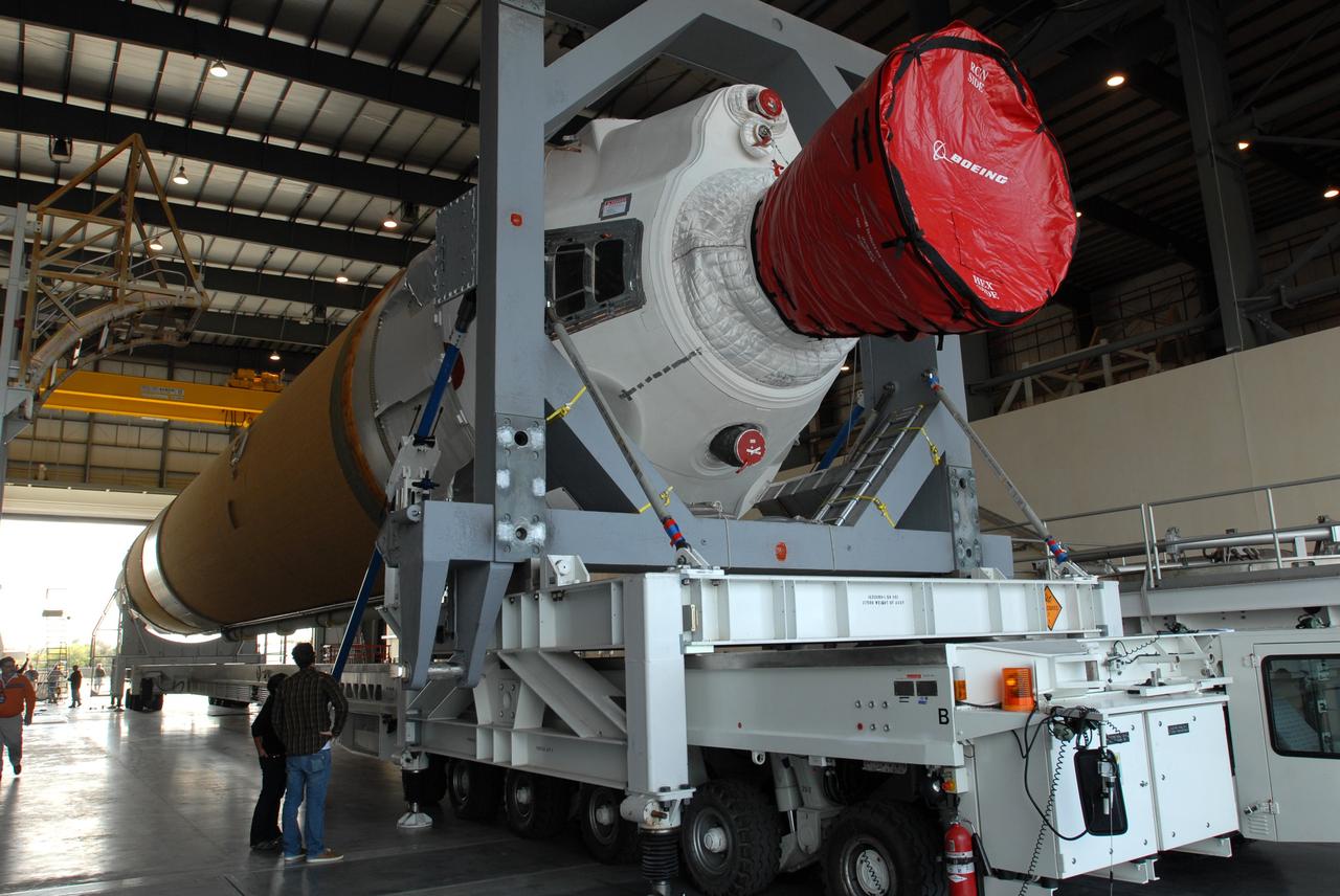 CAPE CANAVERAL, Fla. – On Complex 37 at Cape Canaveral Air Force Station in Florida, the GOES-O and Delta IV second stage are being prepared to leave the Horizontal Integration Facility. They will be moved to the launch pad. GOES–O is one of a series of Geostationary Operational Environmental Satellites. The multi-mission GOES series N-P will be a vital contributor to weather, solar and space operations and science. NASA and the National Oceanic and Atmospheric Administration, or NOAA, are actively engaged in a cooperative program to expand the existing GOES system with the launch of the GOES N-P satellites. Launch of the GOES-O is targeted for no earlier than April 2009. Photo credit: NASA/Jim Grossmann