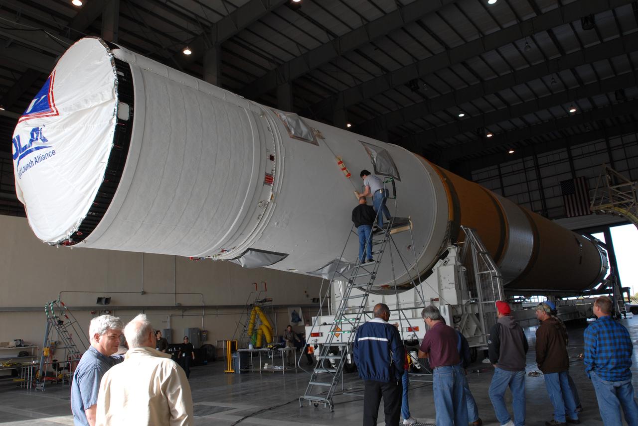CAPE CANAVERAL, Fla. – On Complex 37 at Cape Canaveral Air Force Station in Florida, the GOES-O and Delta IV second stage are being prepared to leave the Horizontal Integration Facility. They will be moved to the launch pad. GOES–O is one of a series of Geostationary Operational Environmental Satellites. The multi-mission GOES series N-P will be a vital contributor to weather, solar and space operations and science. NASA and the National Oceanic and Atmospheric Administration, or NOAA, are actively engaged in a cooperative program to expand the existing GOES system with the launch of the GOES N-P satellites. Launch of the GOES-O is targeted for no earlier than April 2009. Photo credit: NASA/Jim Grossmann