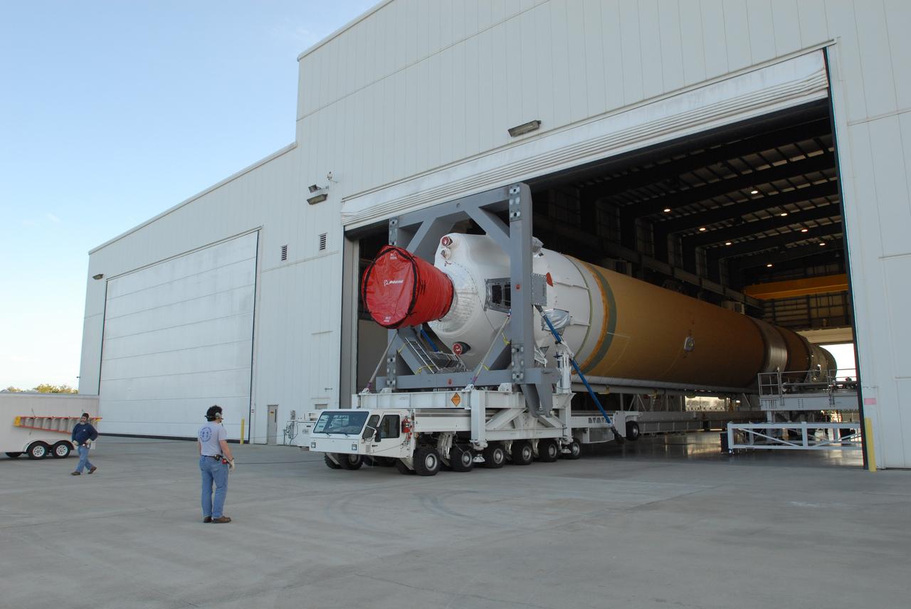 CAPE CANAVERAL, Fla. – On Complex 37 at Cape Canaveral Air Force Station in Florida, workers secure the framework around the GOES-O and Delta IV second stage before they leave the Horizontal Integration Facility for the launch pad. GOES–O is one of a series of Geostationary Operational Environmental Satellites. The multi-mission GOES series N-P will be a vital contributor to weather, solar and space operations and science. NASA and the National Oceanic and Atmospheric Administration, or NOAA, are actively engaged in a cooperative program to expand the existing GOES system with the launch of the GOES N-P satellites. Launch of the GOES-O is targeted for no earlier than April 2009. Photo credit: NASA/Jim Grossmann