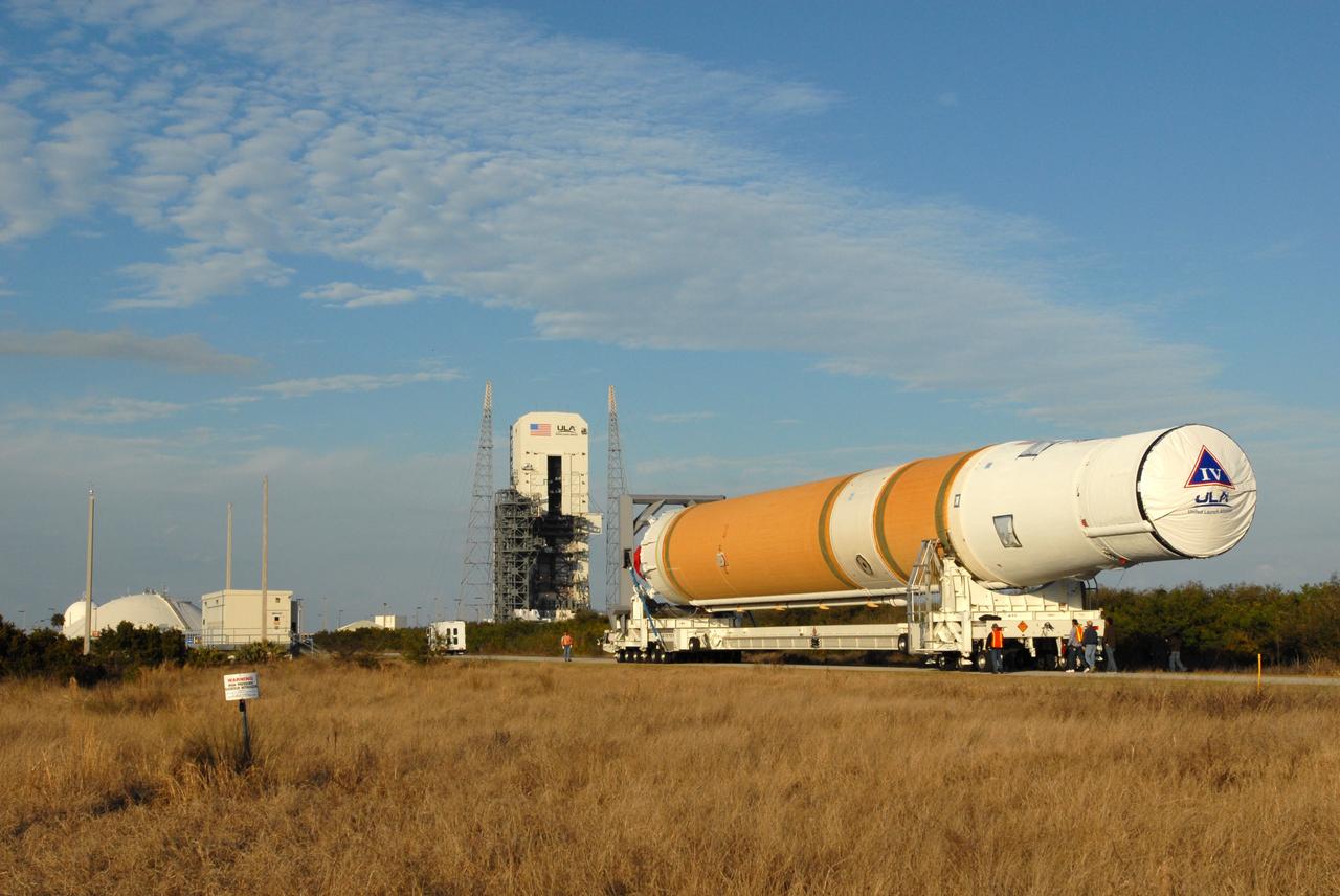CAPE CANAVERAL, Fla. – At Cape Canaveral Air Force Station in Florida, the GOES-O and Delta IV second stage are transported to Launch Pad 37. GOES–O is one of a series of Geostationary Operational Environmental Satellites. The multi-mission GOES series N-P will be a vital contributor to weather, solar and space operations and science. NASA and the National Oceanic and Atmospheric Administration, or NOAA, are actively engaged in a cooperative program to expand the existing GOES system with the launch of the GOES N-P satellites. Launch of the GOES-O is targeted for no earlier than April 2009. Photo credit: NASA/Jim Grossmann