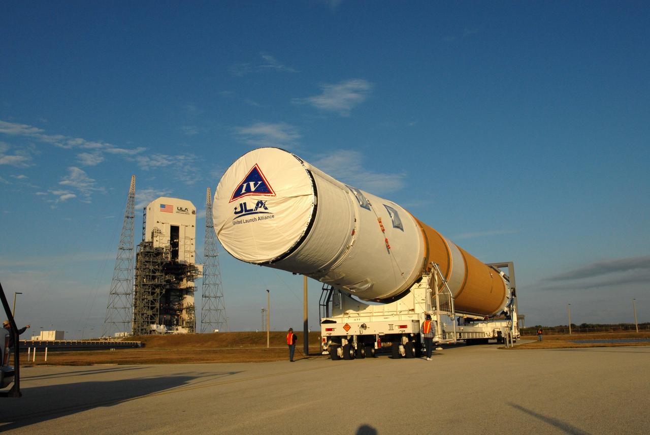 CAPE CANAVERAL, Fla. – At Cape Canaveral Air Force Station in Florida, the GOES-O and Delta IV second stage roll toward Launch Pad 37. GOES–O is one of a series of Geostationary Operational Environmental Satellites. The multi-mission GOES series N-P will be a vital contributor to weather, solar and space operations and science. NASA and the National Oceanic and Atmospheric Administration, or NOAA, are actively engaged in a cooperative program to expand the existing GOES system with the launch of the GOES N-P satellites. Launch of the GOES-O is targeted for no earlier than April 2009. Photo credit: NASA/Jim Grossmann