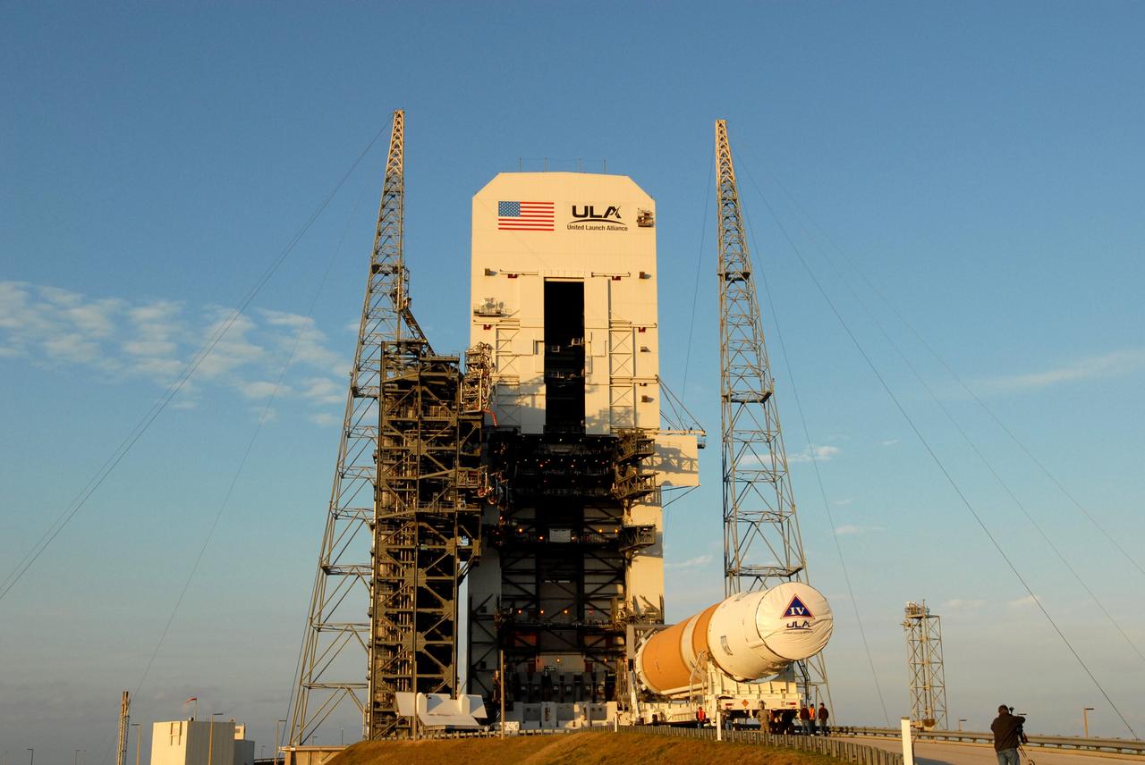CAPE CANAVERAL, Fla. – At Cape Canaveral Air Force Station in Florida, the GOES-O and Delta IV second stage arrive on Launch Pad 37. They will be raised to vertical and moved into the mobile service tower. GOES–O is one of a series of Geostationary Operational Environmental Satellites. The multi-mission GOES series N-P will be a vital contributor to weather, solar and space operations and science. NASA and the National Oceanic and Atmospheric Administration, or NOAA, are actively engaged in a cooperative program to expand the existing GOES system with the launch of the GOES N-P satellites. Launch of the GOES-O is targeted for no earlier than April 2009. Photo credit: NASA/Jim Grossmann