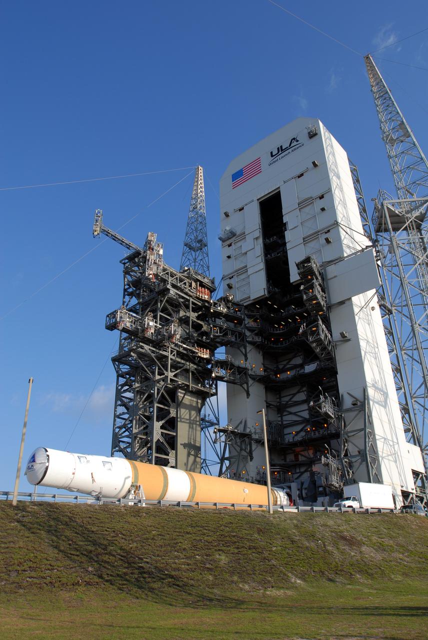 CAPE CANAVERAL, Fla. – On Launch Pad 37 at Cape Canaveral Air Force Station in Florida, the GOES-O and Delta IV upper stage are waiting to be raised to vertical. They will be moved into the mobile service tower for prelaunch preparations. GOES–O is one of a series of Geostationary Operational Environmental Satellites. The multi-mission GOES series N-P will be a vital contributor to weather, solar and space operations and science. NASA and the National Oceanic and Atmospheric Administration, or NOAA, are actively engaged in a cooperative program to expand the existing GOES system with the launch of the GOES N-P satellites. Launch of the GOES-O is targeted for no earlier than April 2009. Photo credit: NASA/Jim Grossmann