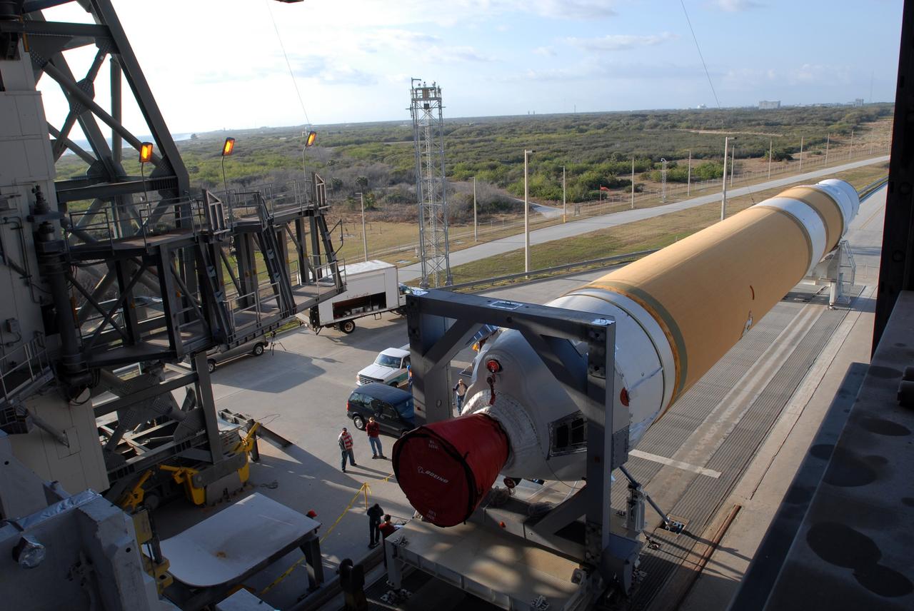 CAPE CANAVERAL, Fla. – On Launch Pad 37 at Cape Canaveral Air Force Station in Florida, the GOES-O and Delta IV upper stage are waiting to be raised to vertical. They will be moved into the mobile service tower for prelaunch preparations. GOES–O is one of a series of Geostationary Operational Environmental Satellites. The multi-mission GOES series N-P will be a vital contributor to weather, solar and space operations and science. NASA and the National Oceanic and Atmospheric Administration, or NOAA, are actively engaged in a cooperative program to expand the existing GOES system with the launch of the GOES N-P satellites. Launch of the GOES-O is targeted for no earlier than April 2009. Photo credit: NASA/Jim Grossmann