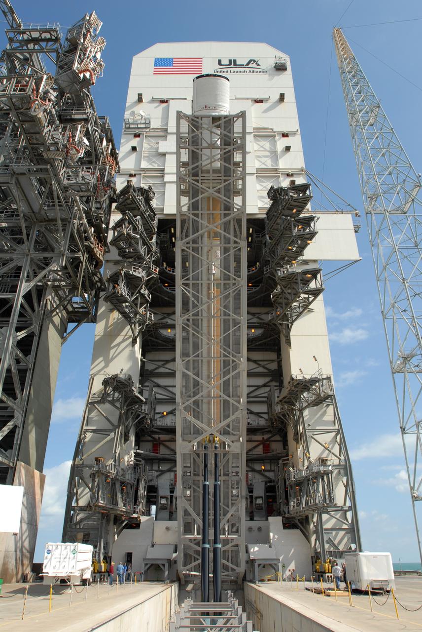 CAPE CANAVERAL, Fla. – – On Launch Pad 37 at Cape Canaveral Air Force Station in Florida, the GOES-O and Delta IV upper stage are being raised to vertical. They will be moved into the mobile service tower for prelaunch preparations. GOES–O is one of a series of Geostationary Operational Environmental Satellites. The multi-mission GOES series N-P will be a vital contributor to weather, solar and space operations and science. NASA and the National Oceanic and Atmospheric Administration, or NOAA, are actively engaged in a cooperative program to expand the existing GOES system with the launch of the GOES N-P satellites. Launch of the GOES-O is targeted for no earlier than April 2009. Photo credit: NASA/Jim Grossmann