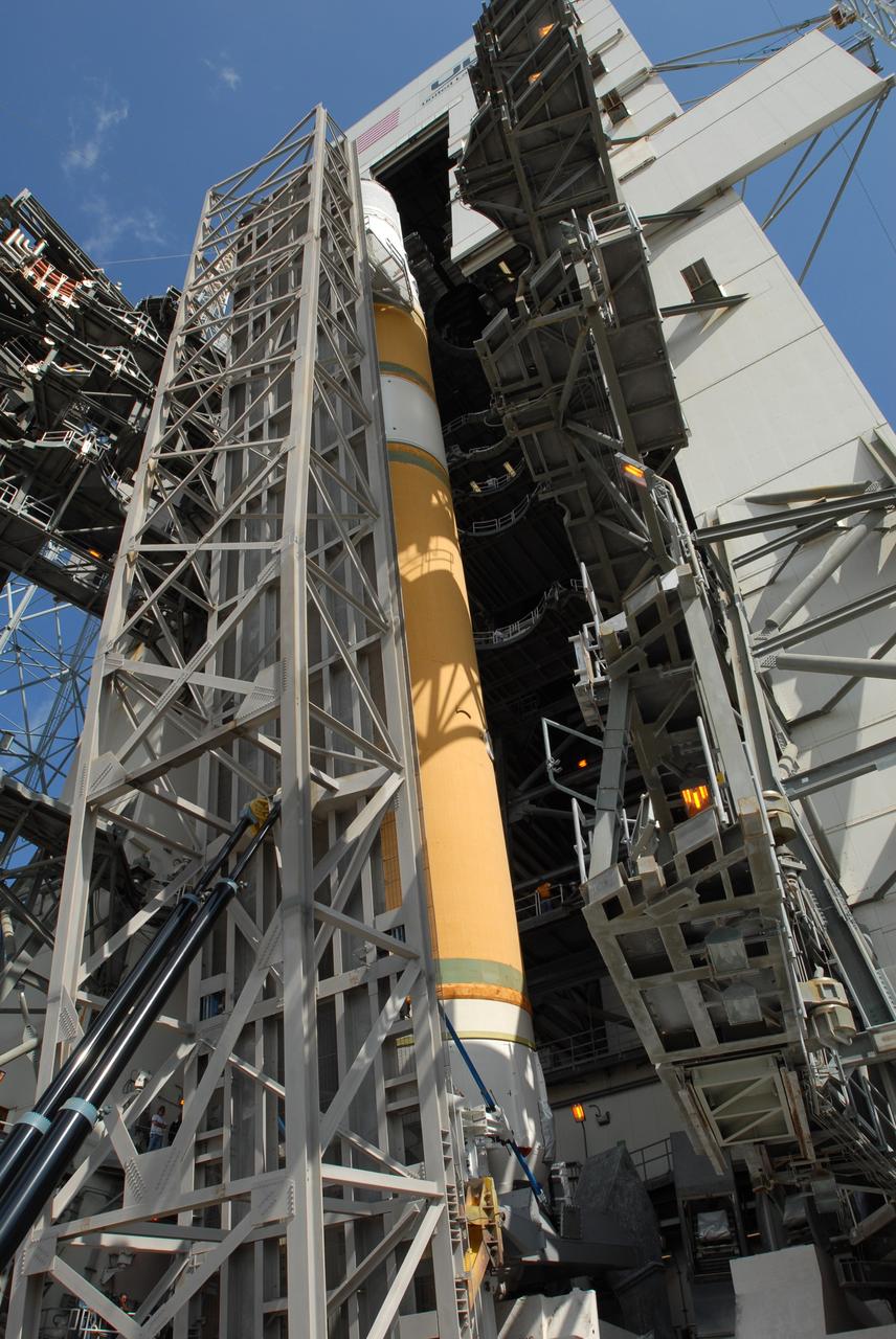 CAPE CANAVERAL, Fla. – On Launch Pad 37 at Cape Canaveral Air Force Station in Florida, the GOES-O and Delta IV upper stage have been raised to vertical. They will be moved into the mobile service tower for prelaunch preparations. GOES–O is one of a series of Geostationary Operational Environmental Satellites. The multi-mission GOES series N-P will be a vital contributor to weather, solar and space operations and science. NASA and the National Oceanic and Atmospheric Administration, or NOAA, are actively engaged in a cooperative program to expand the existing GOES system with the launch of the GOES N-P satellites. Launch of the GOES-O is targeted for no earlier than April 2009. Photo credit: NASA/Jim Grossmann