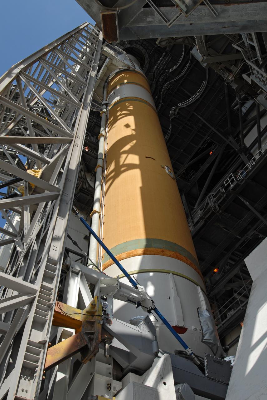 CAPE CANAVERAL, Fla. – On Launch Pad 37 at Cape Canaveral Air Force Station in Florida, the GOES-O and Delta IV upper stage are moved into the mobile service tower for prelaunch preparations. GOES–O is one of a series of Geostationary Operational Environmental Satellites. The multi-mission GOES series N-P will be a vital contributor to weather, solar and space operations and science. NASA and the National Oceanic and Atmospheric Administration, or NOAA, are actively engaged in a cooperative program to expand the existing GOES system with the launch of the GOES N-P satellites. Launch of the GOES-O is targeted for no earlier than April 2009. Photo credit: NASA/Jim Grossmann