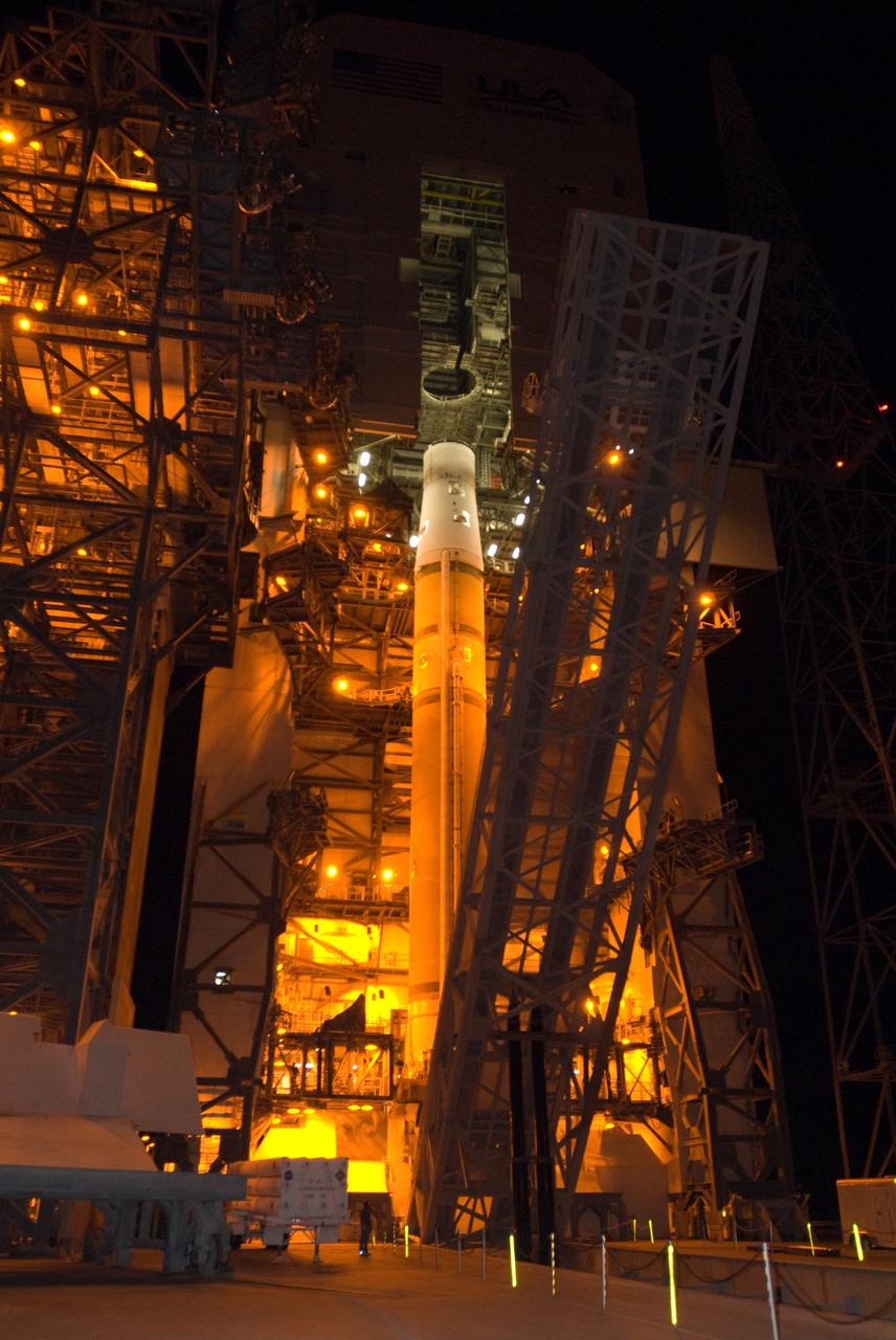 CAPE CANAVERAL, Fla. – On Launch Pad 37 at Cape Canaveral Air Force Station in Florida, the lifting mechanism that raised the GOES-O and Delta IV upper stage to vertical is lowered toward the ground. GOES–O is one of a series of Geostationary Operational Environmental Satellites. The multi-mission GOES series N-P will be a vital contributor to weather, solar and space operations and science. NASA and the National Oceanic and Atmospheric Administration, or NOAA, are actively engaged in a cooperative program to expand the existing GOES system with the launch of the GOES N-P satellites. Launch of the GOES-O is targeted for no earlier than April 2009. Photo credit: NASA/Jim Grossmann