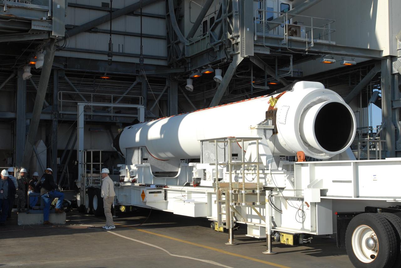 CAPE CANAVERAL, Fla. – On Launch Pad 37 at Cape Canaveral Air Force Station in Florida, one of the solid rocket boosters to be mated to the GOES-O Delta IV rocket arrives. GOES–O is one of a series of Geostationary Operational Environmental Satellites. The multi-mission GOES series N-P will be a vital contributor to weather, solar and space operations and science. NASA and the National Oceanic and Atmospheric Administration, or NOAA, are actively engaged in a cooperative program to expand the existing GOES system with the launch of the GOES N-P satellites. Launch of the GOES-O is targeted for no earlier than April 2009. Photo credit: NASA/Jim Grossmann