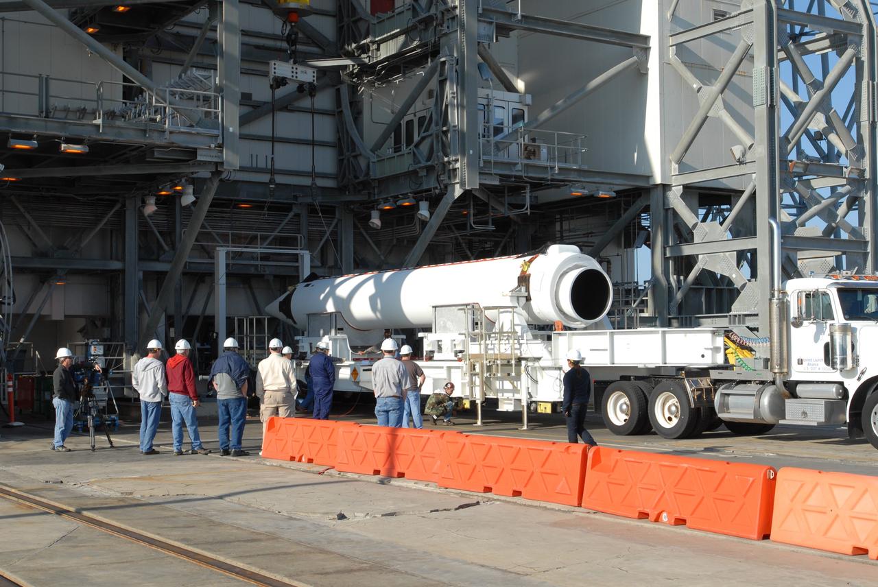 CAPE CANAVERAL, Fla. – On Launch Pad 37 at Cape Canaveral Air Force Station in Florida, lifting and mating of a solid rocket booster to the GOES-O Delta IV rocket is scrubbed due to high winds on the pad. GOES–O is one of a series of Geostationary Operational Environmental Satellites. The multi-mission GOES series N-P will be a vital contributor to weather, solar and space operations and science. NASA and the National Oceanic and Atmospheric Administration, or NOAA, are actively engaged in a cooperative program to expand the existing GOES system with the launch of the GOES N-P satellites. Launch of the GOES-O is targeted for no earlier than April 2009. Photo credit: NASA/Jim Grossmann