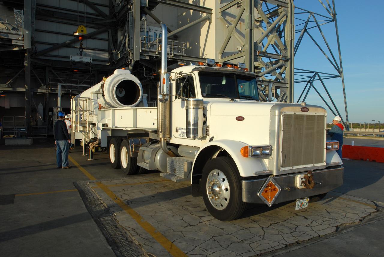 CAPE CANAVERAL, Fla. – One of two solid rocket boosters arrives on Launch Pad 37 at Cape Canaveral Air Force Station.  it is the left rocket and it will be lifted into the mobile service tower and mated to the GOES-O Delta IV launch vehicle. GOES–O is one of a series of Geostationary Operational Environmental Satellites. The multi-mission GOES series N-P will be a vital contributor to weather, solar and space operations and science. NASA and the National Oceanic and Atmospheric Administration, or NOAA, are actively engaged in a cooperative program to expand the existing GOES system with the launch of the GOES N-P satellites. Launch of the GOES-O is targeted for no earlier than April 2009.    Photo credit: NASA/Ben Smegelsky